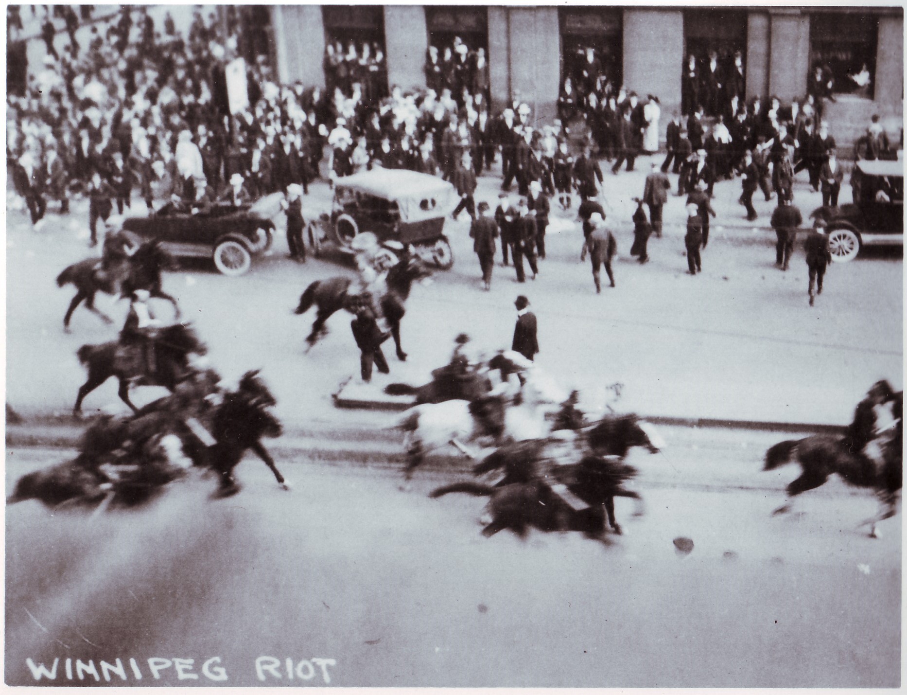 Special constables on horseback rushed through a crowd at the corner of Portage and Main on June 10, 1919 (Archives of Manitoba)