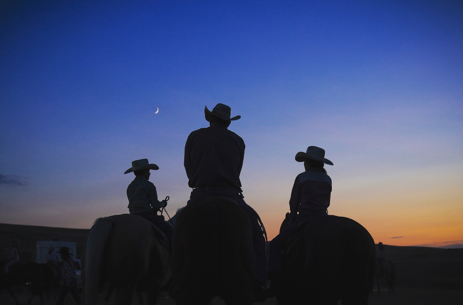 Cowboys wait their turn to compete.