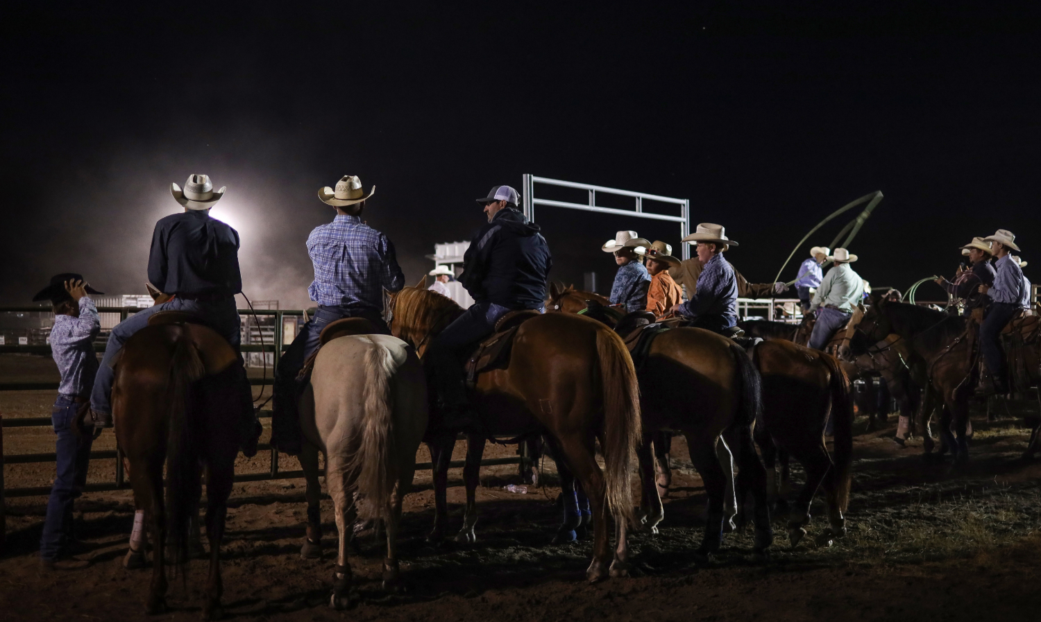 Cowboys watching the end of the Saturday performance.