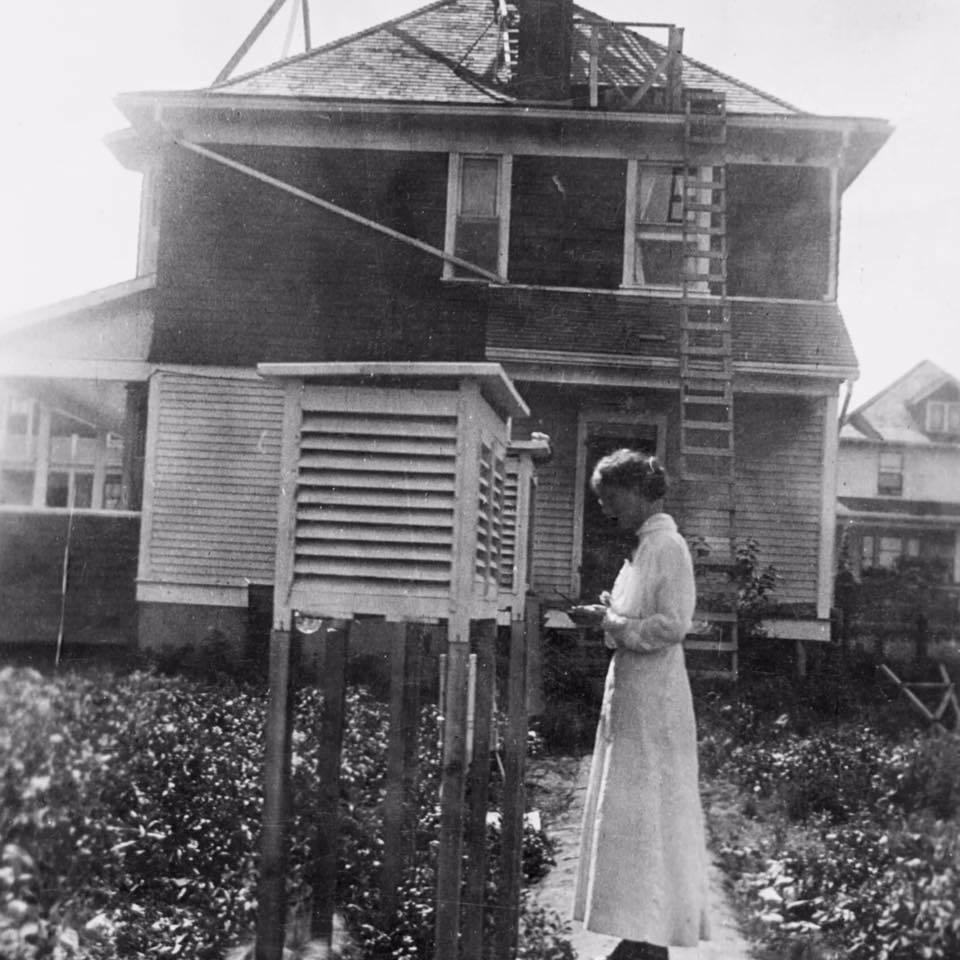 Eda Owen in front of the Dominion weather station. (Supplied by Sandra Storey)