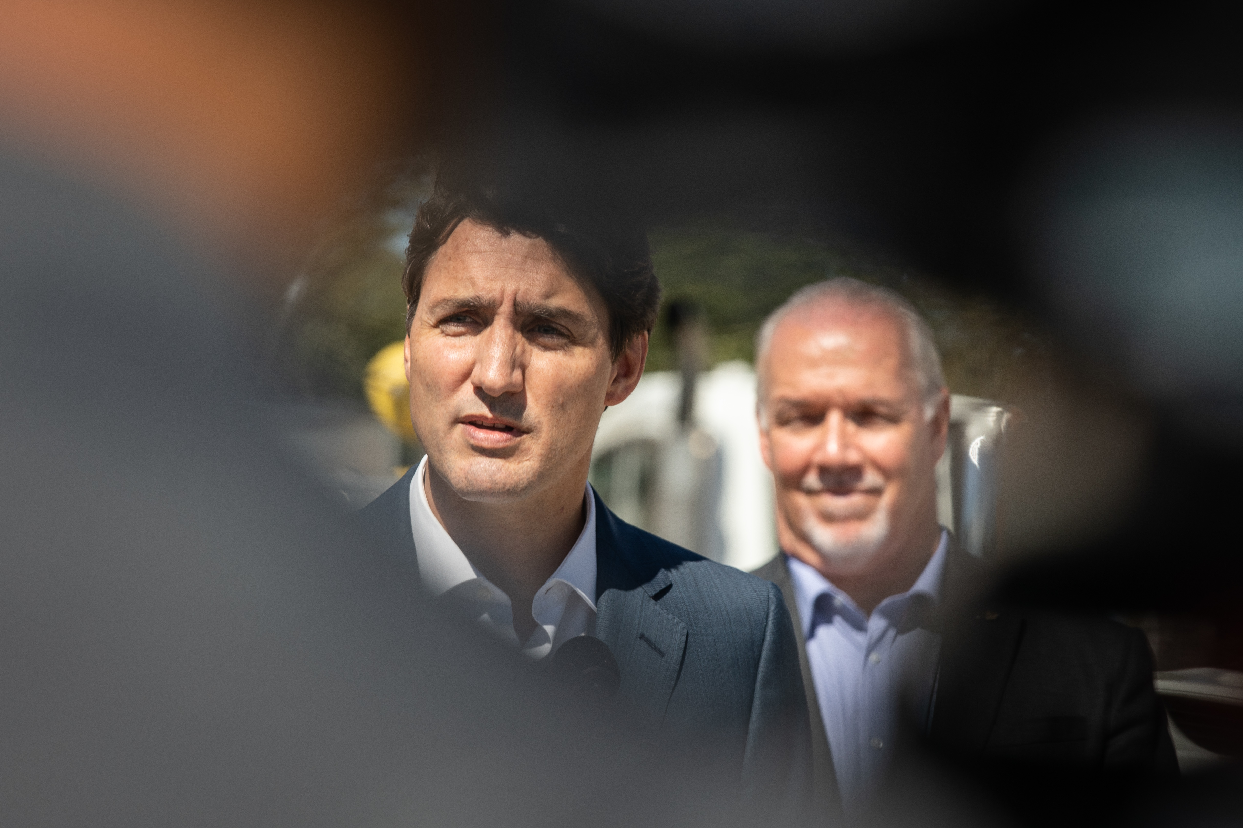 Prime Minister Justin Trudeau and B.C. Premier John Horgan make an announcement at the B.C. Hydro Trades Training Centre in Surrey on Aug. 29, 2019. (Maggie MacPherson/CBC)