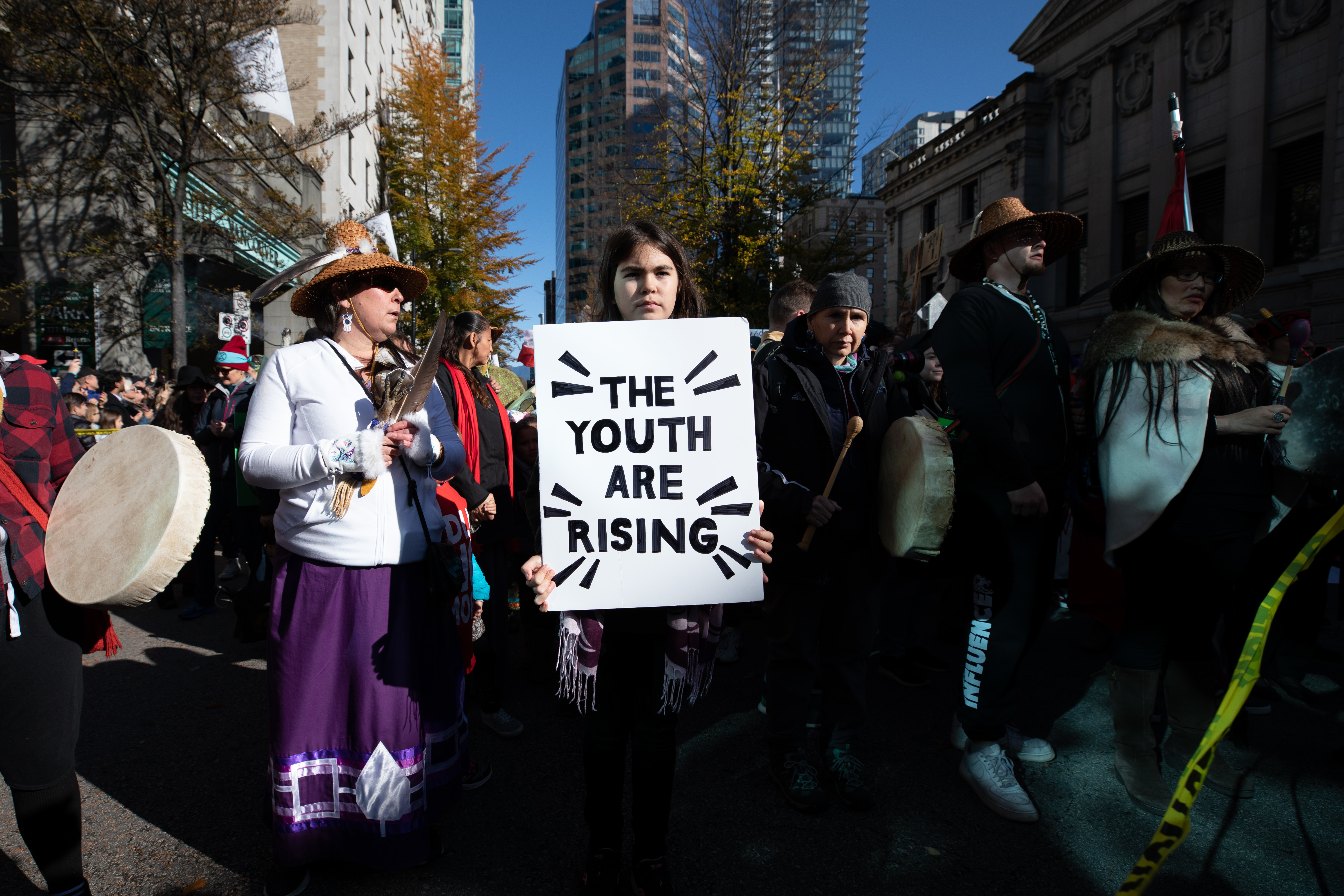 A climate activist holds a sign during a climate strike in Vancouver attended by Greta Thunberg on Friday, Oct. 25, 2019. (Maggie MacPherson/CBC)