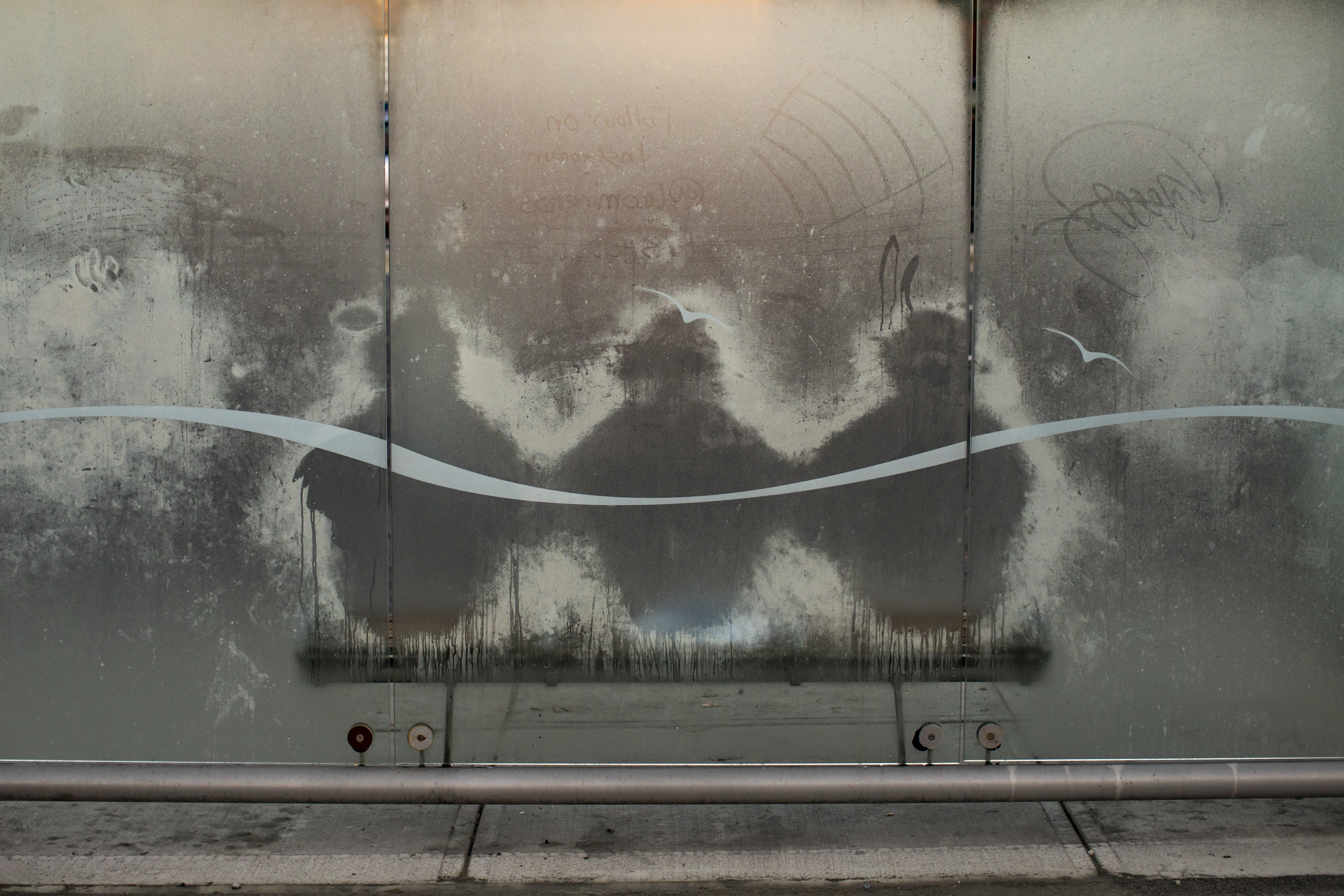 Figures of commuters are left on a frost-covered bus stop in Vancouver on Nov. 22, 2019. (Ben Nelms/CBC)