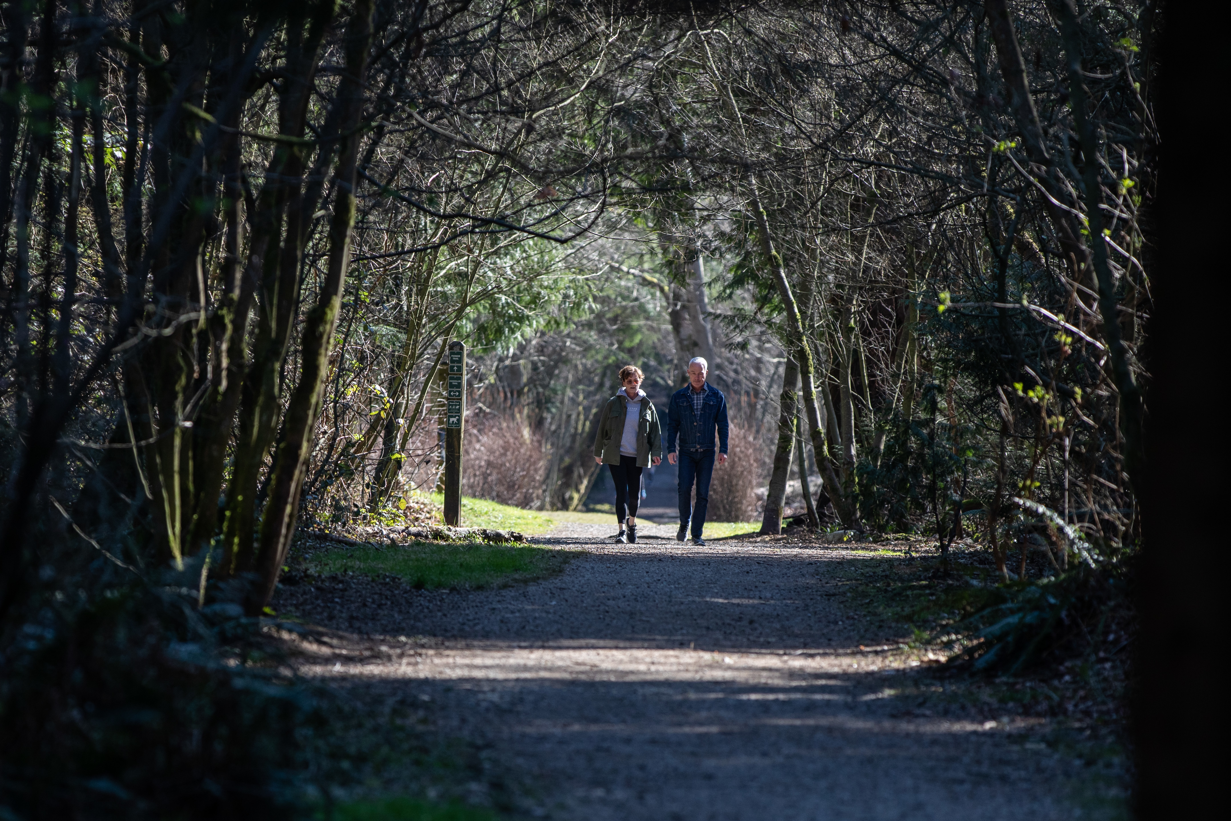 People walk through Pacific Spirit Park in Vancouver on Wednesday, March 18, 2020. (Maggie MacPherson/CBC)