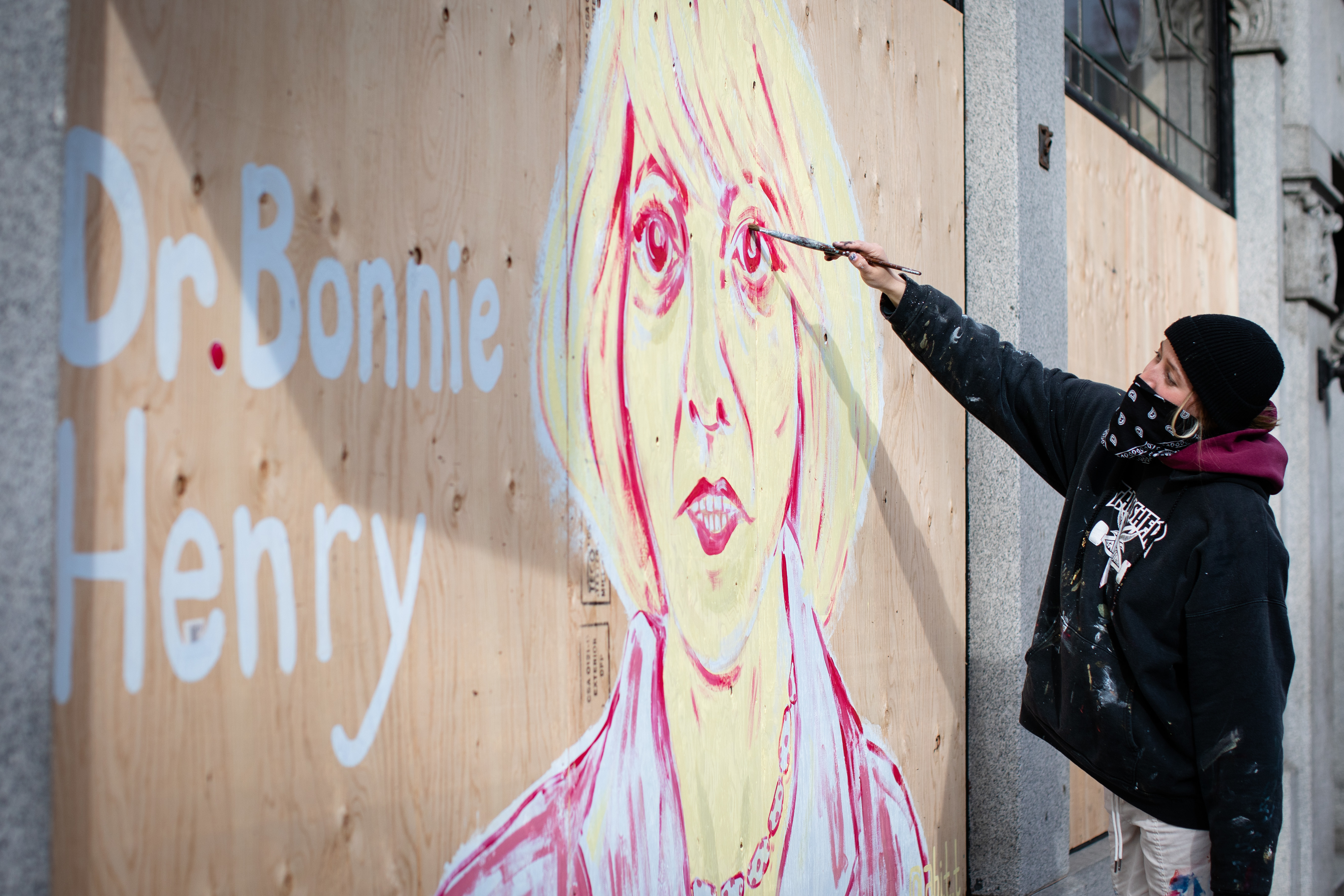 Emily Carr student Abi Taylor paints B.C.’s provincial health officer Dr. Bonnie Henry. 'The doctors are on the front lines right now and they’re the ones risking their lives to save other people. So this is just ... saying thanks for all the work that you guys are doing,' says Taylor.