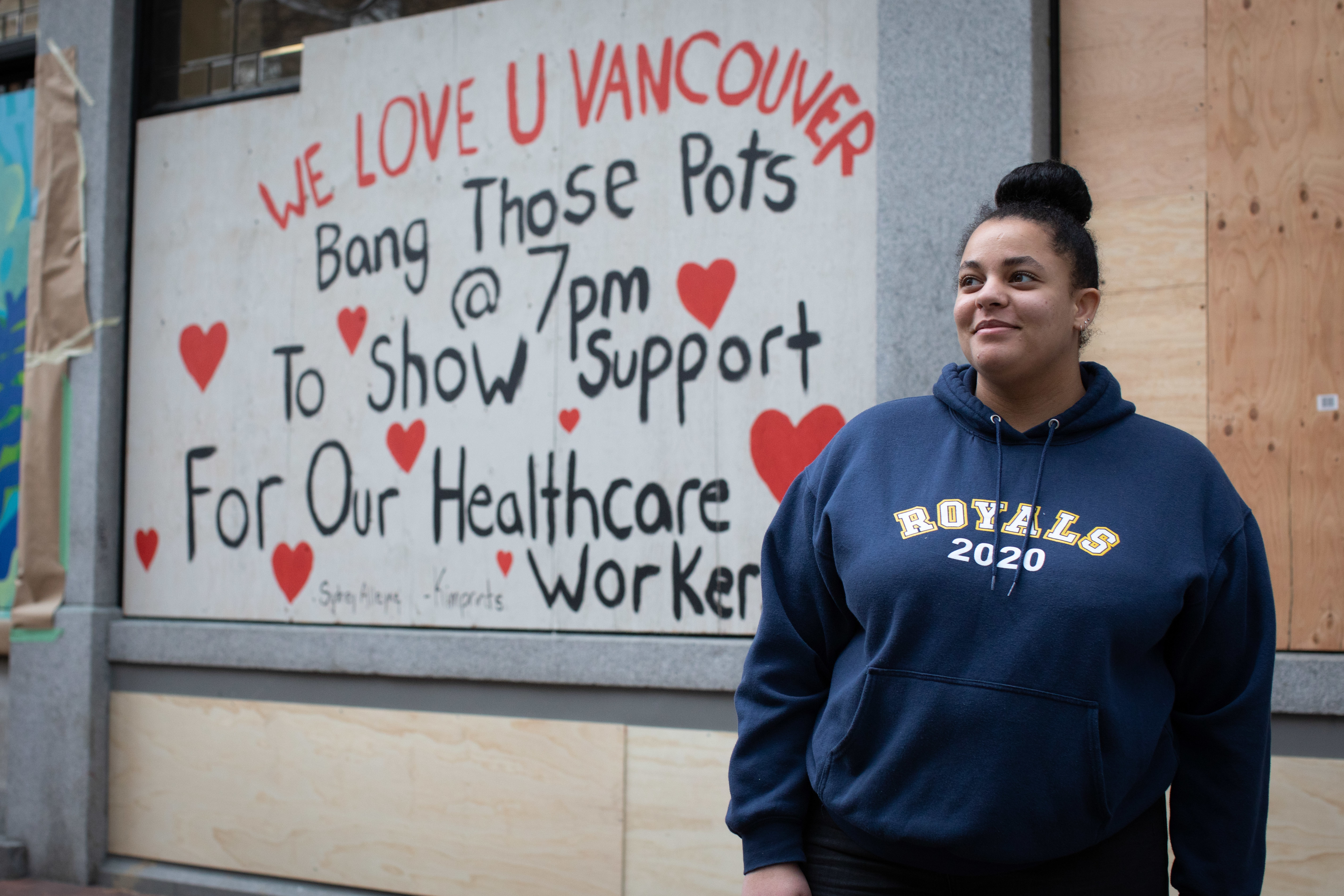 Briscoe's daughter Sydney Alleyne has painted several of the panels, including one that reminds Vancouverites to celebrate health care workers every night at 7 p.m. from their windows and balconies.