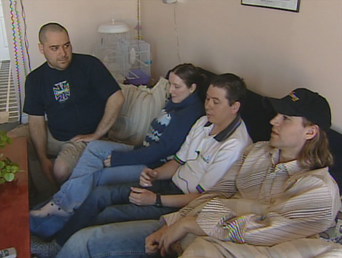 (Left to right) Peter Hamel, Jennifer Hamel, Shawn Broomfield and Greg Finlay share the details of their snowmobile accident in 2005 with CBC News. (CBC)