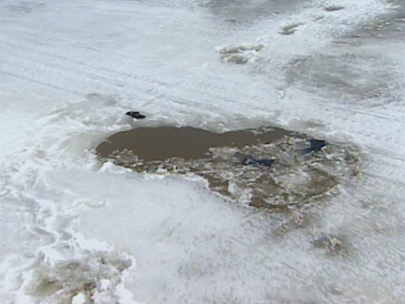 When Peter Hamel's snowmobile went through the ice on Terrington Basin in 2005, he and his wife Jennifer did not realize the trouble in which they would find themselves. (CBC)