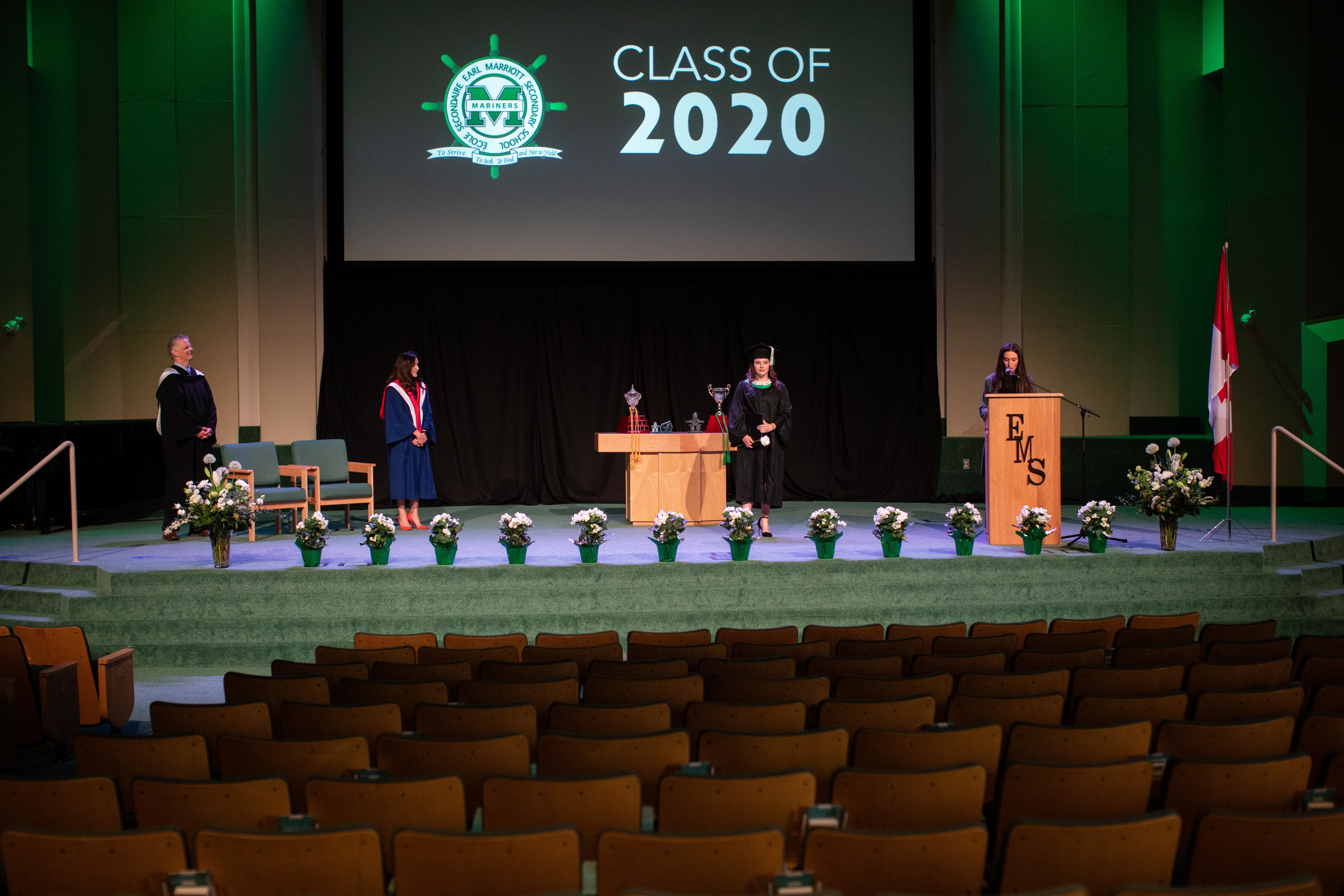 To maintain physical distancing, family members were not allowed inside the church to see their children graduate, but they will get a recording of the event. (Maggie MacPherson/CBC)