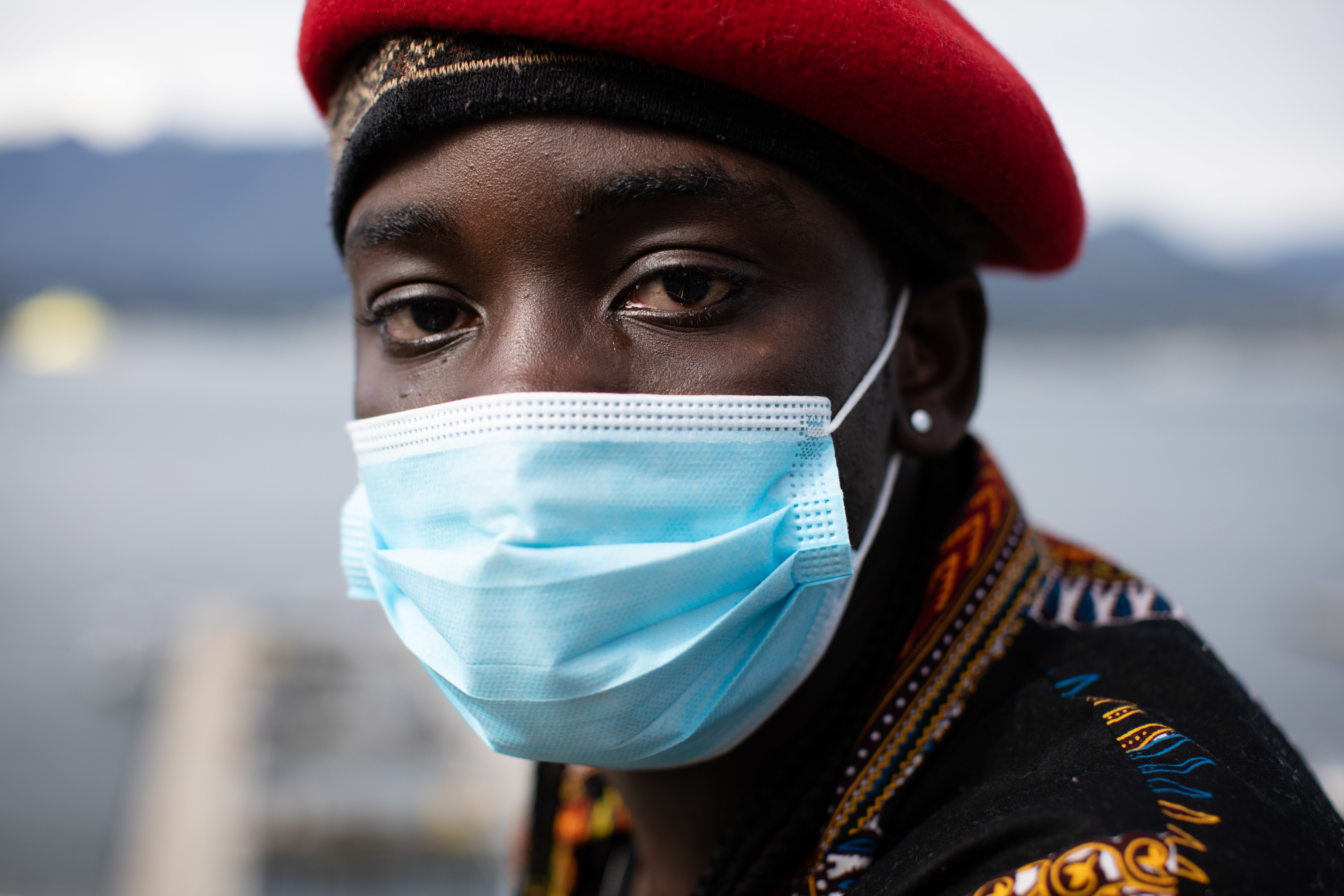 As a tear drops from his eye, Gabriel Lucky Gbeneyei says, “I just want to let everybody know that we are all one. …we are human beings and we deserve to be loved. We deserve to be protected.” 