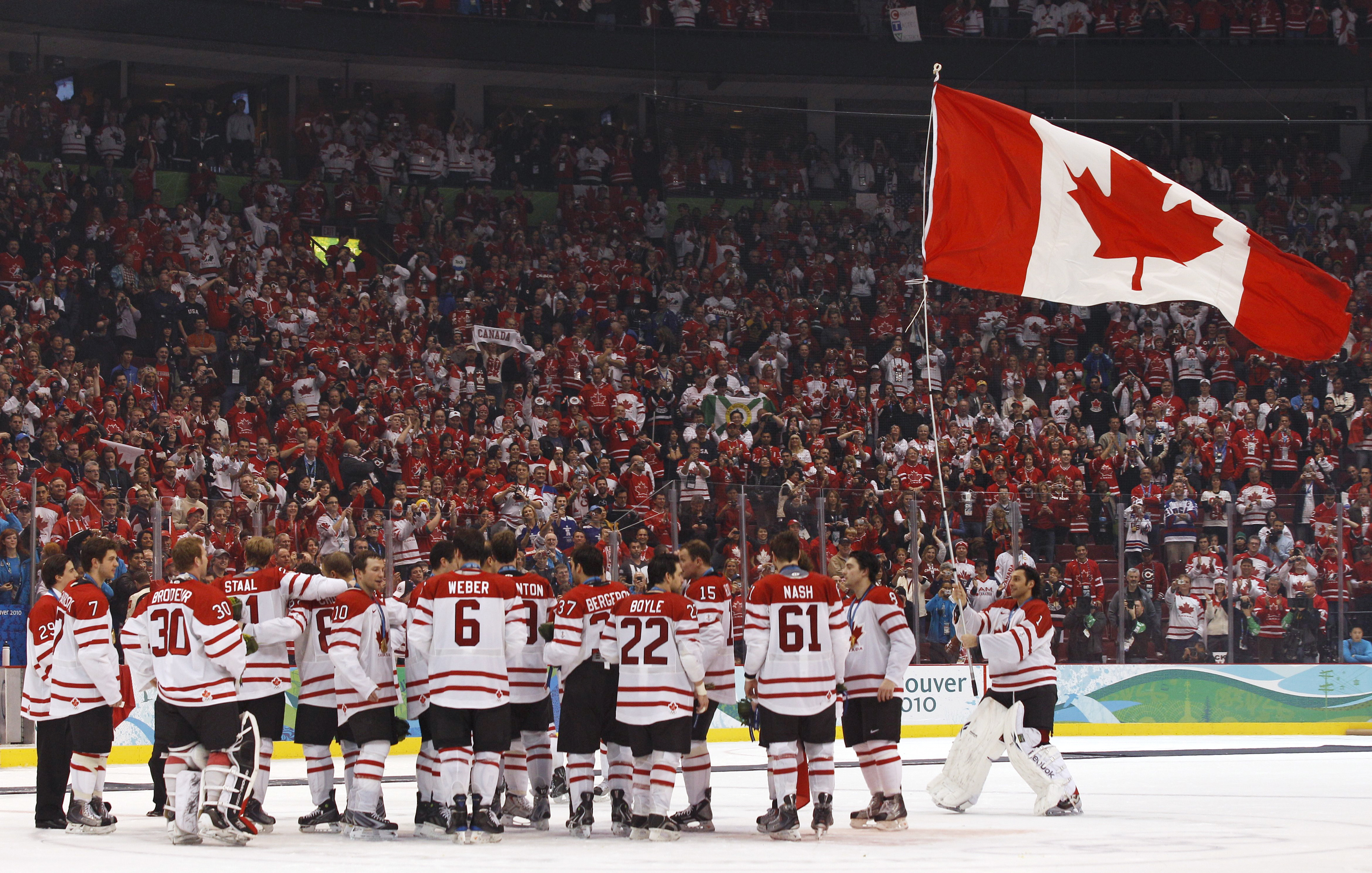 Feb. 28, 2010 - Vancouver, British Columbia, Canada - Canada's SIDNEY CROSBY  celebrates his game winning goal over USA's RYAN MILLER in overtime to give  Canada the gold medal in Men's Gold