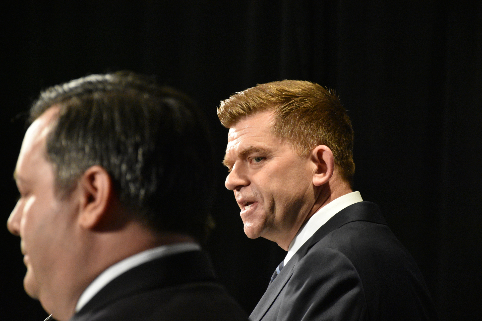 Former Wildrose leader Brian Jean shares a stage with Jason Kenney during the leadership race in 2017. (Terry Reith/CBC)