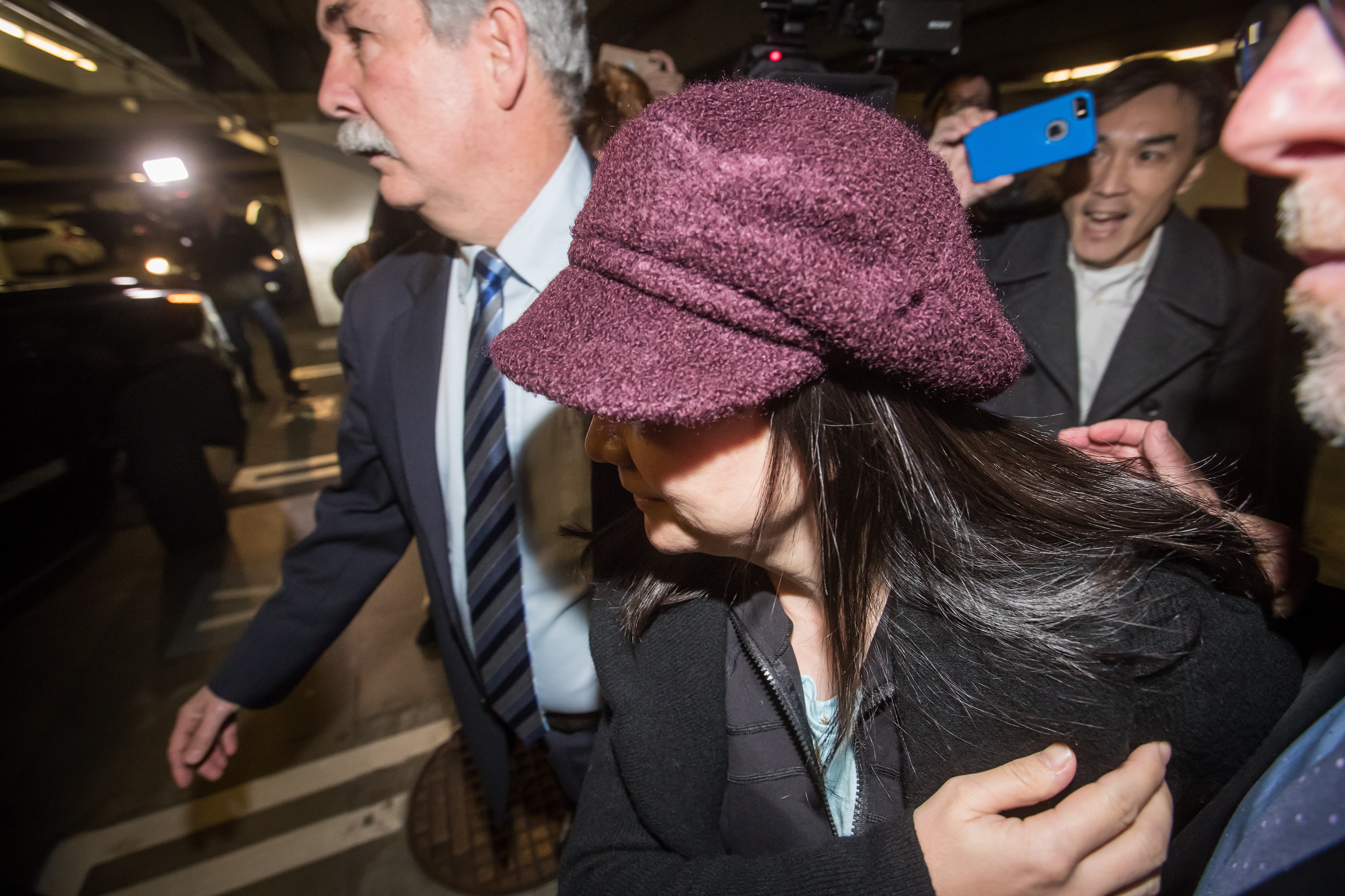 Huawei chief financial officer Meng Wanzhou leaves through an underground parking lot after a court appearance regarding her bail conditions, in Vancouver, on Tuesday January 29, 2019. (Darryl Dyck/Canadian Press)