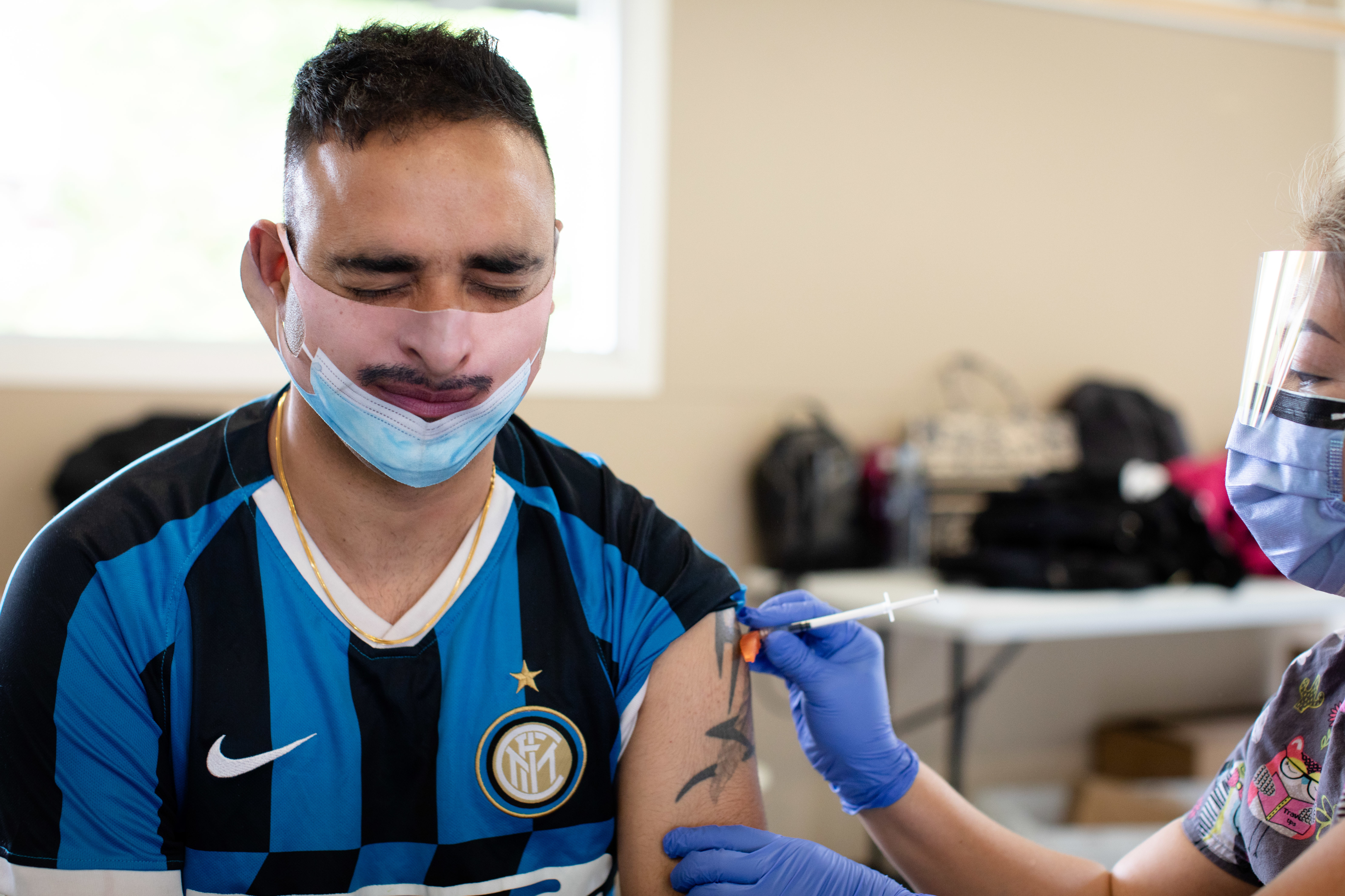 A Pfizer vaccine is administered at Bear Creek Park in Surrey, B.C., on May 17. (Maggie MacPherson/CBC)