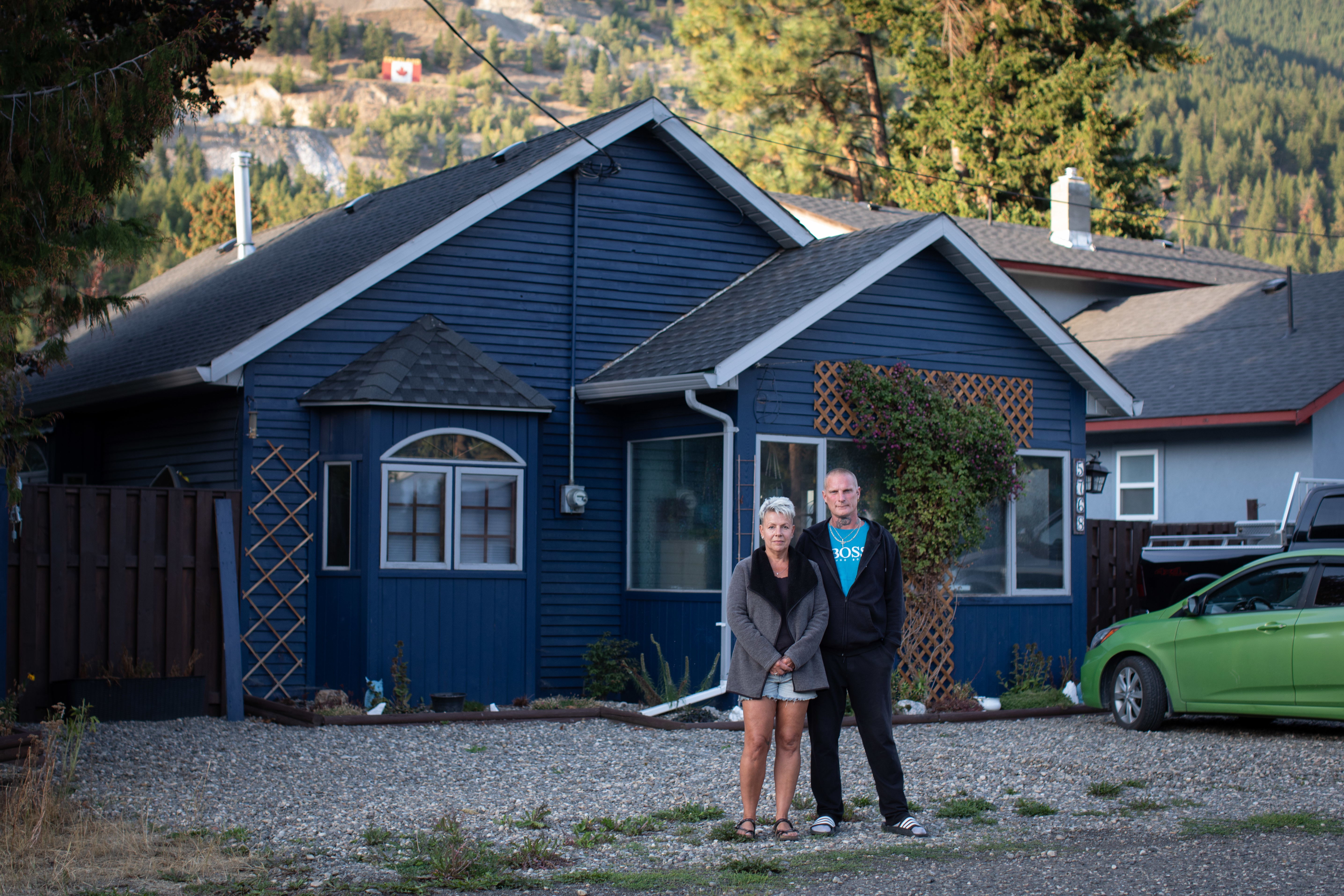 Anna Marsh and Troy Wrixon outside their home in Falkland, B.C., on Sept. 1. They had just moved to the rural community from Chilliwack when they were told to evacuate on Aug. 5. (Maggie MacPherson/CBC)