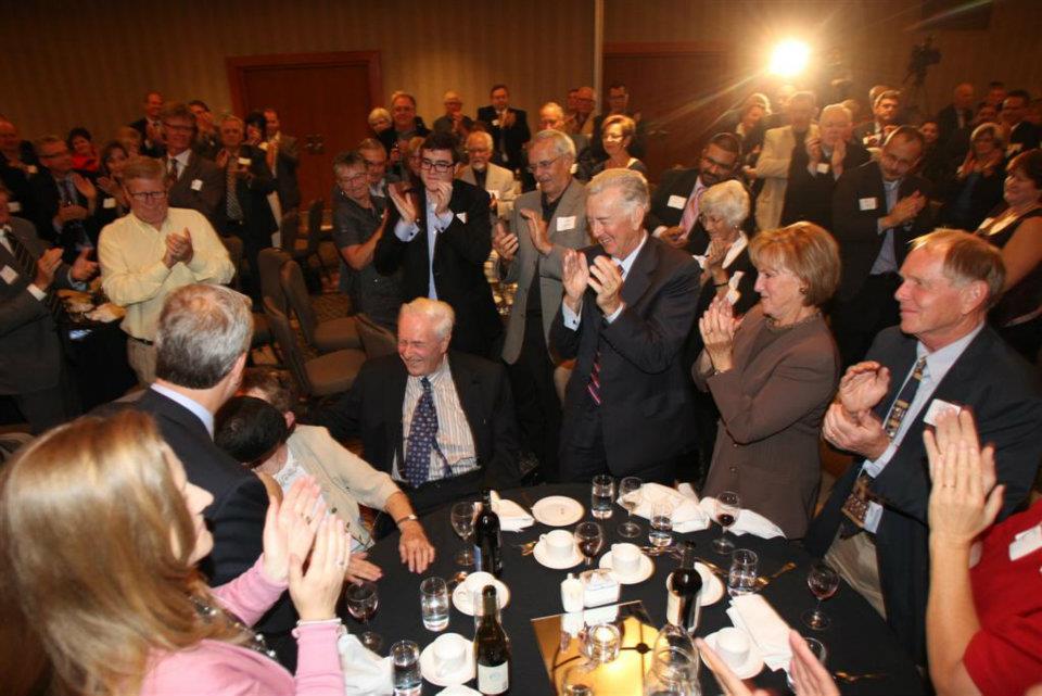 Byfield, seated centre, received a standing ovation from former staffers and politicians like Manning in 2011. (Tom Braid)