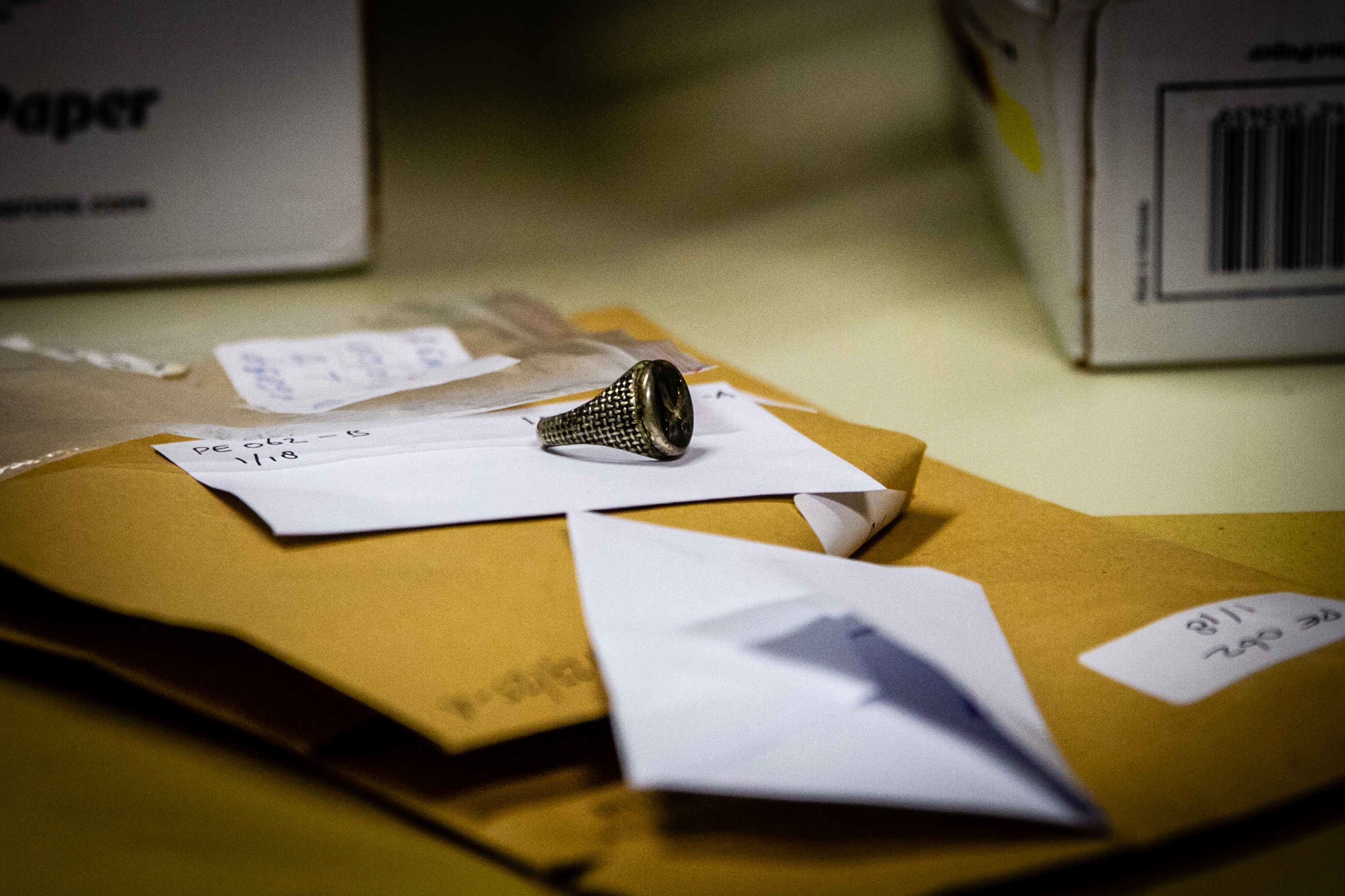 A ring is among the possessions that have been recovered. 'The most important for us is personal belongings that keep in the water,' Pavlidis says. 'Metal is very, very good for us.' (Lily Martin/CBC)