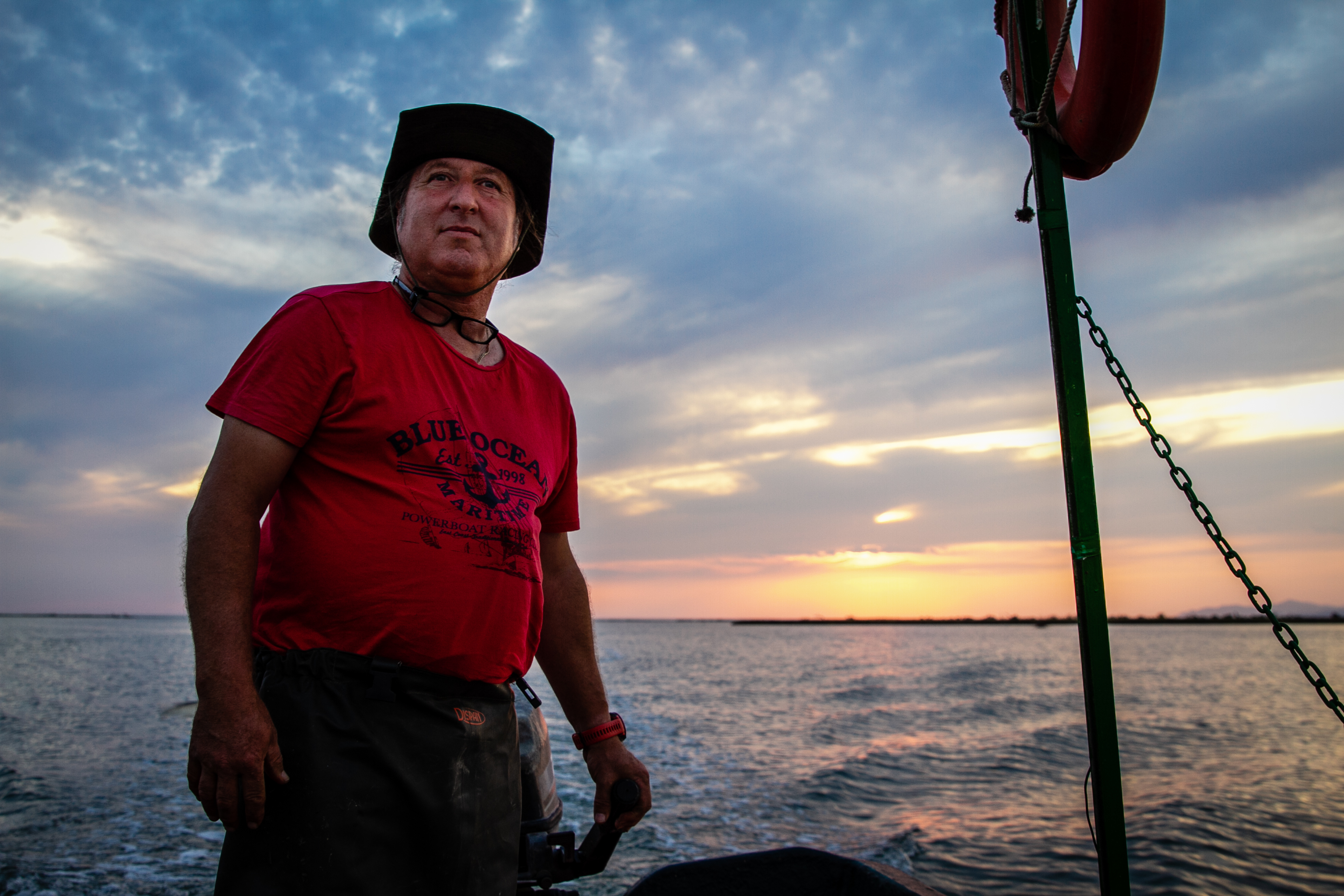 Alexandros Adalis fishes on the Evros river. He and other fishermen gathered on the river to 'push back' migrants in February 2020 when Turkish President Recep Tayipp Erdogan opened the Turkish border and invited migrants to head towards Greece, and so Europe. (Lily Martin/CBC)