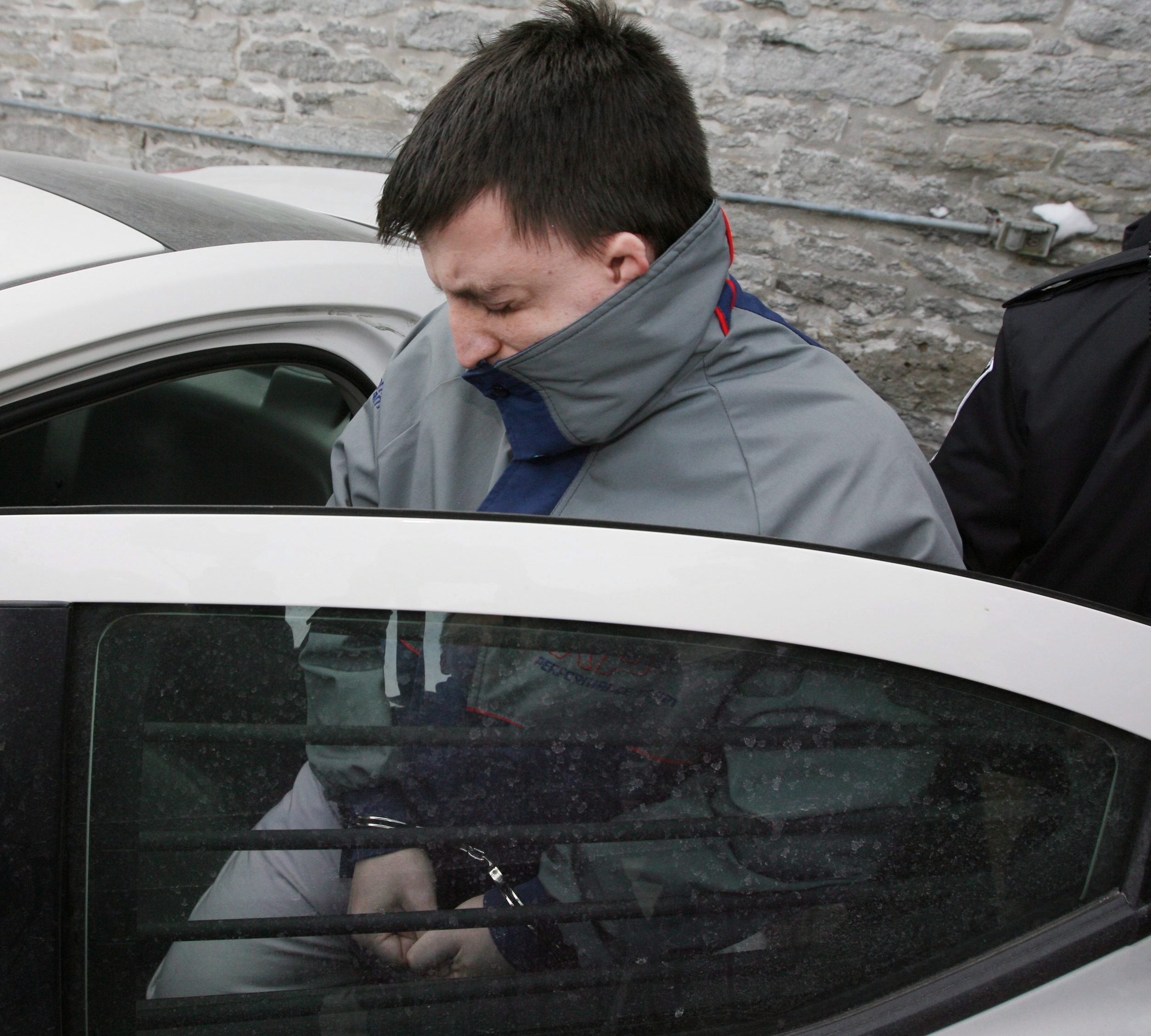 Stanley Tippett gets into a car outside the Superior Court of Justice in Peterborough, Ont., on Dec. 23, 2009 after being handed a guilty verdict in the kidnap and sexual assault of a 12-year-old girl. (Peter Redman/The Canadian Press)