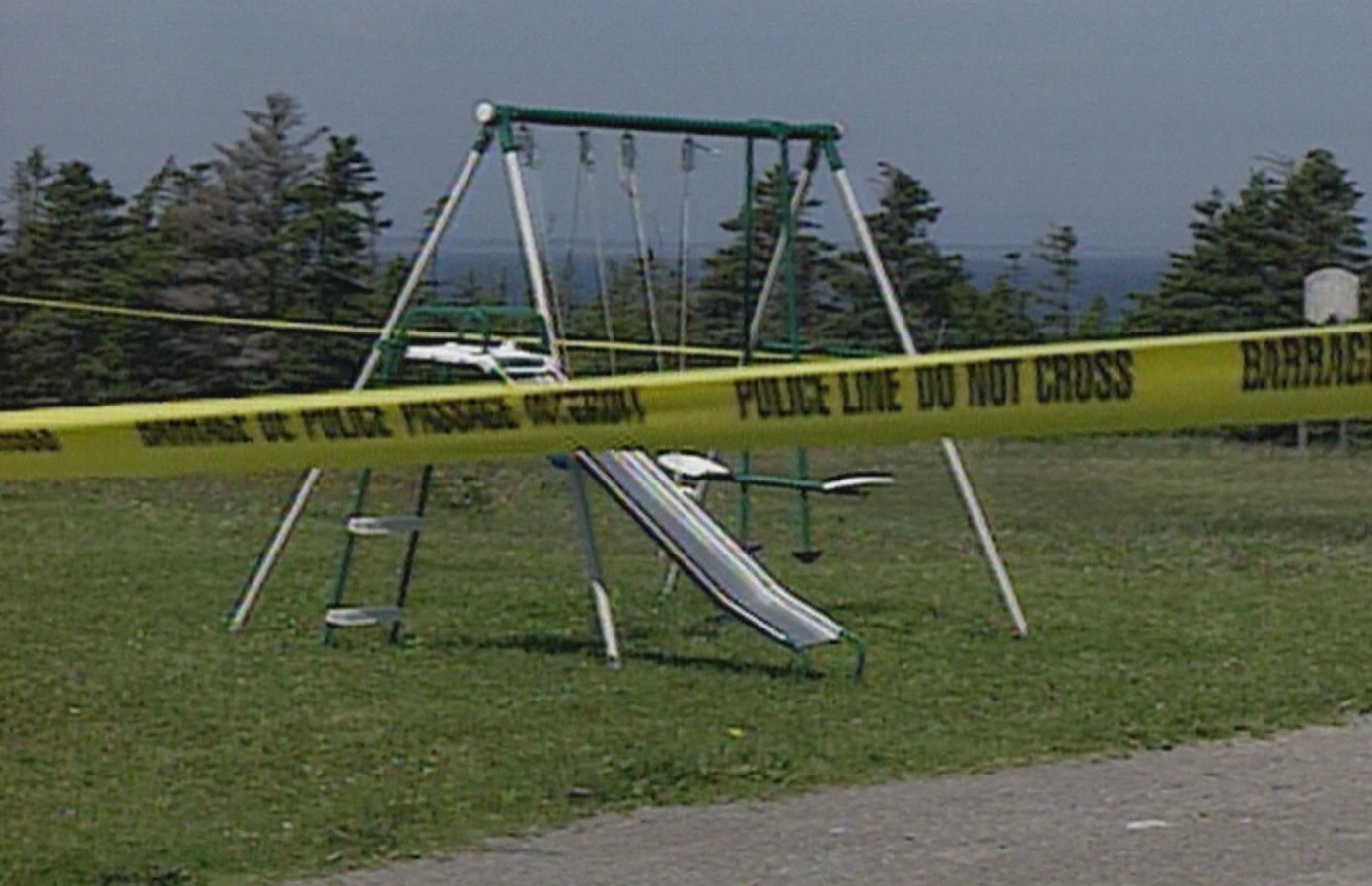 Daniel Benoit has happy memories of playing on this swing set outside his former home in Port au Port West. (CBC)