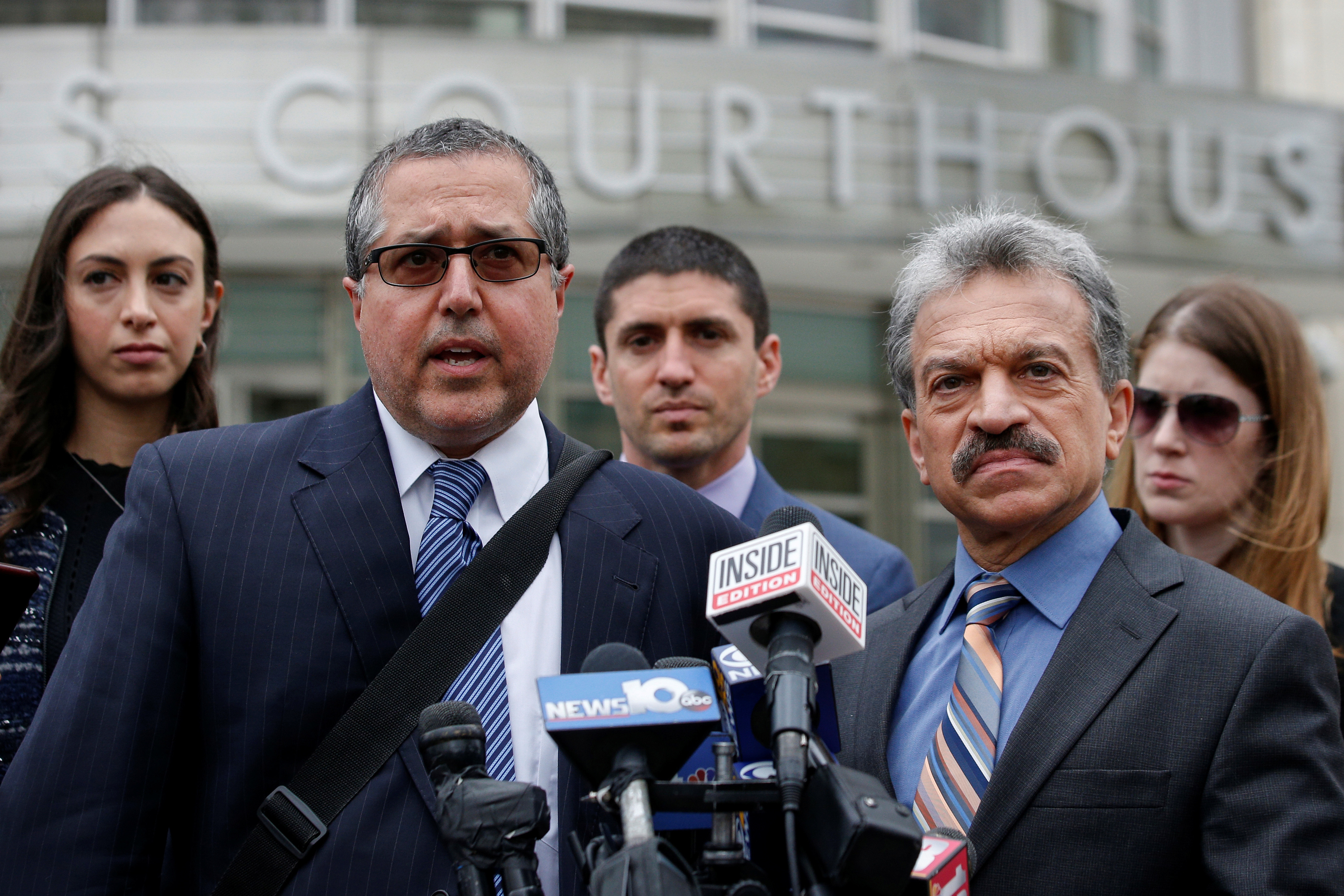 Raniere's lawyers, Marc Agnifilo, left, and Paul DerOhannesian, speak to reporters following a court hearing in New York City on May 4, 2018. (Brendan McDermid/Reuters)