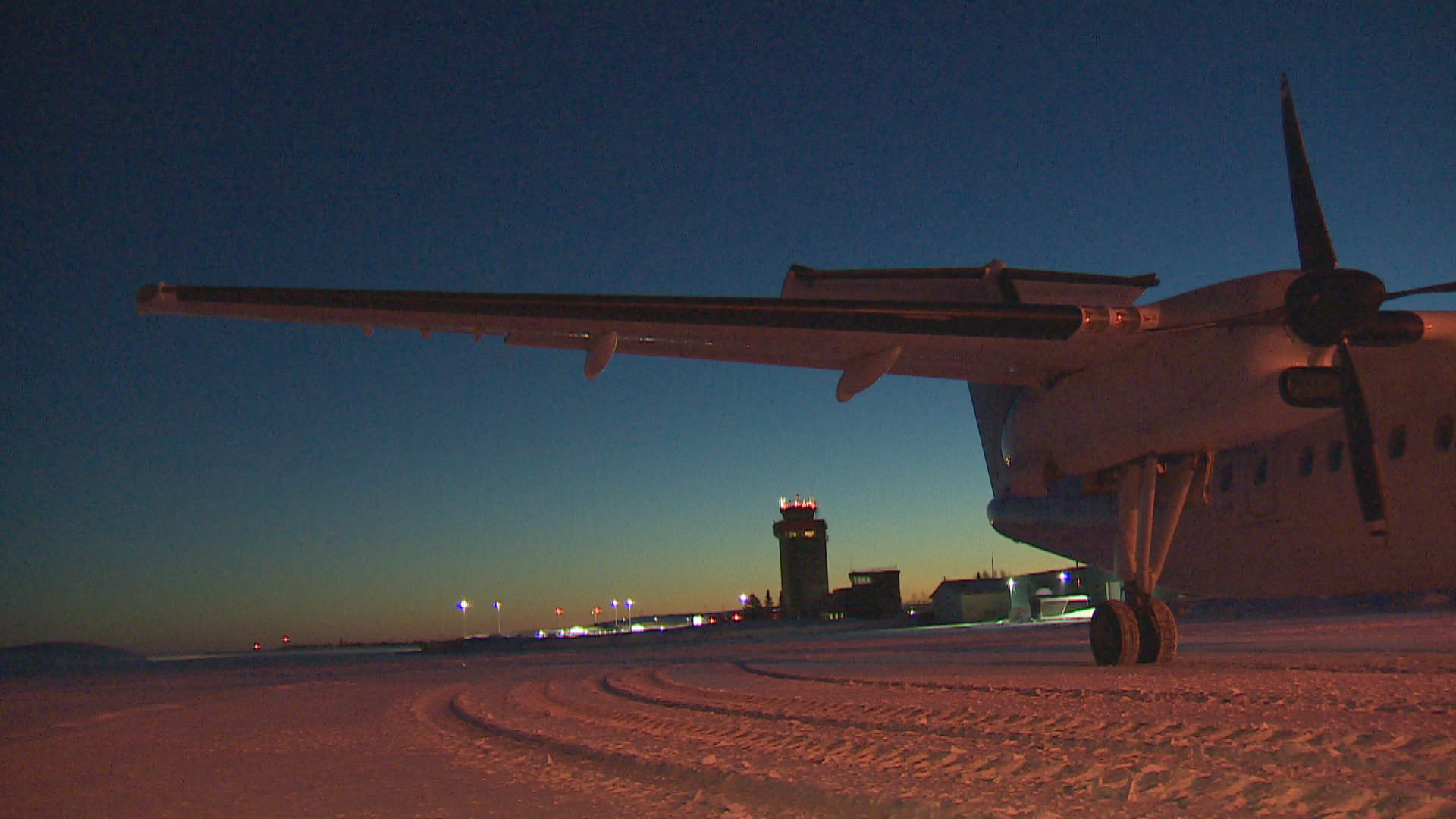 A plane sits at dawn at the Goose Bay Airport. (Bruce Tilley/CBC)