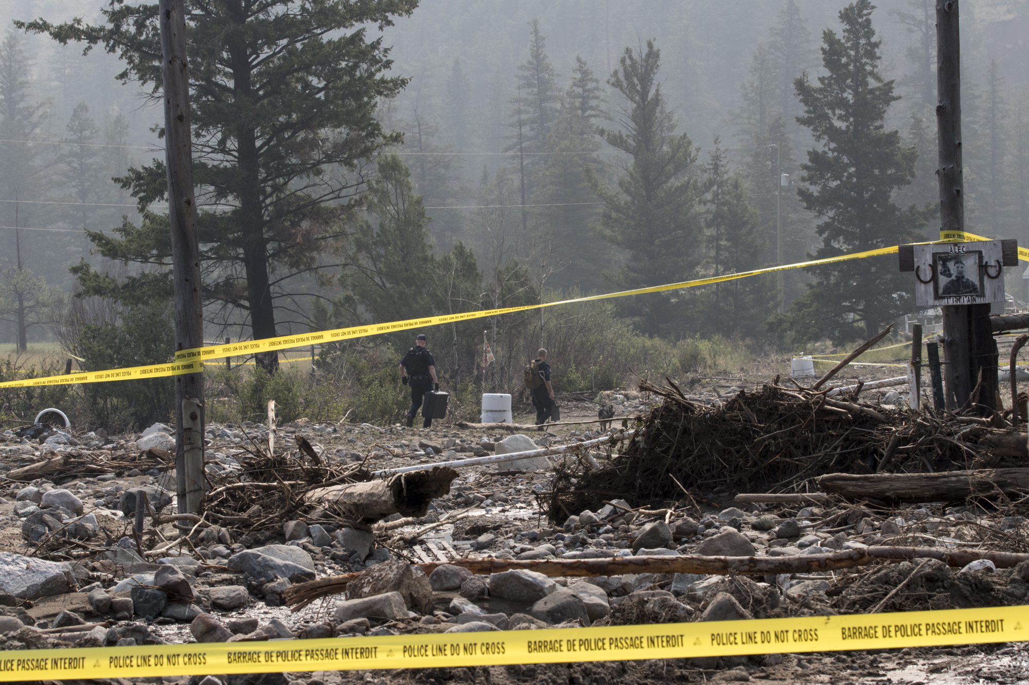 Police dogs with the help of drones set out to find a woman who was swept away by the mudslide along Highway 99 earlier in August. (Tina Lovgreen/CBC)