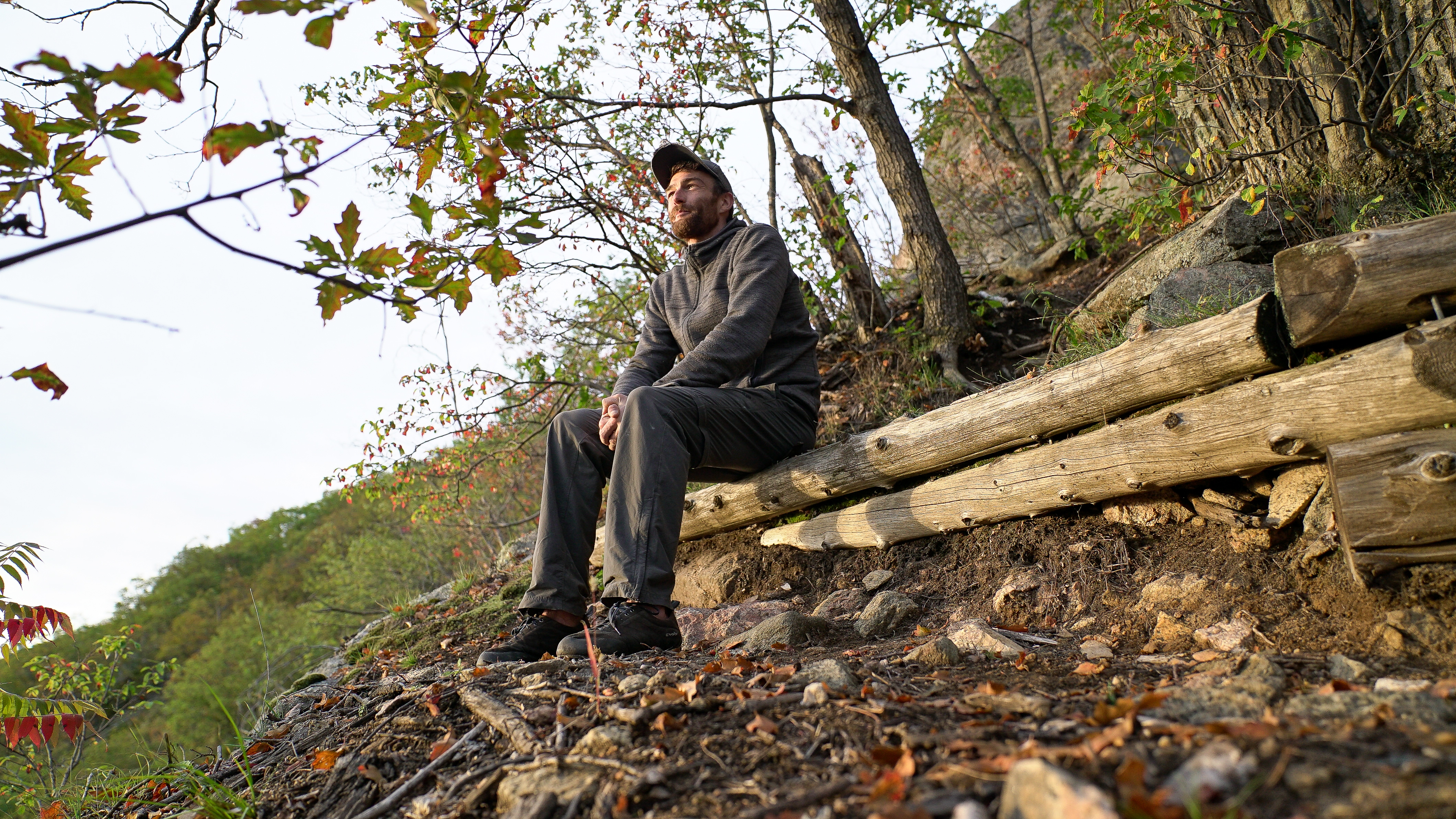 Sean Decaire looks out over Luskville, Que. as the sun sets.  (Alexander Behne/CBC)