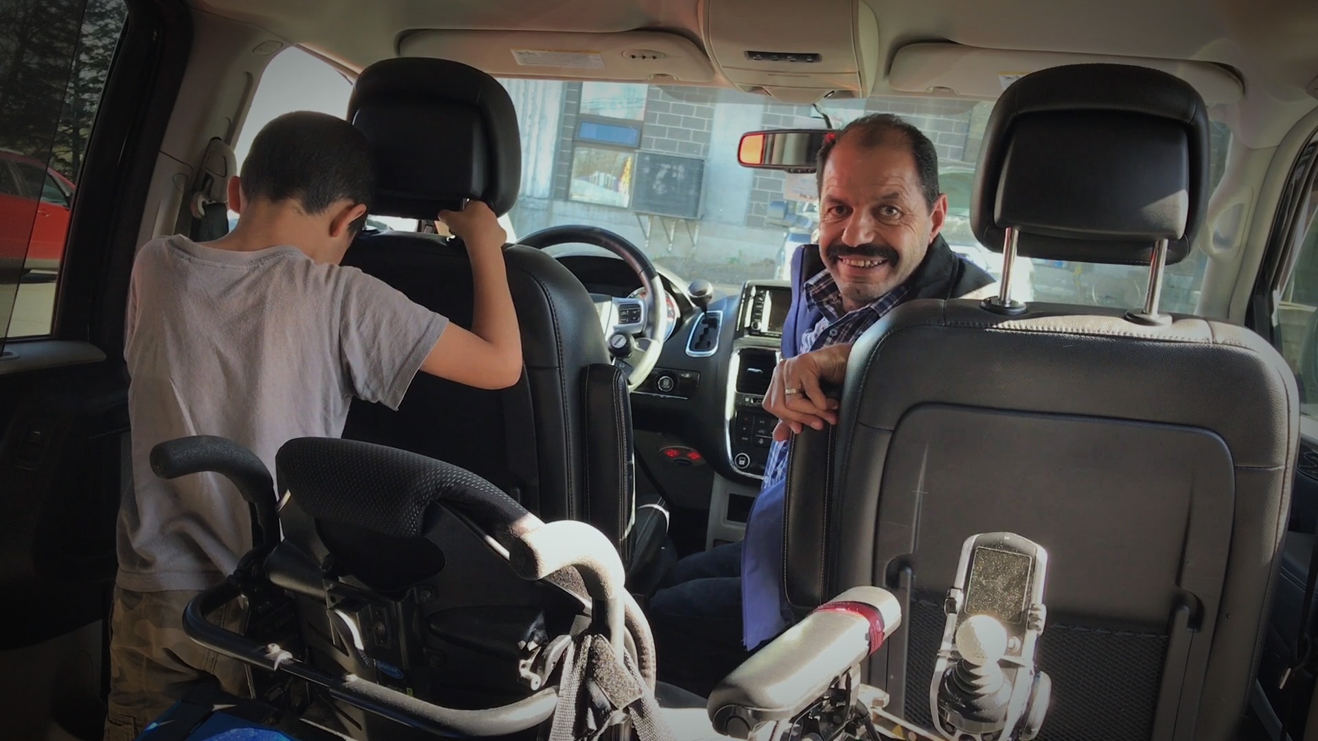 Mohammad and Younes in the van. (Dave Irish/CBC)