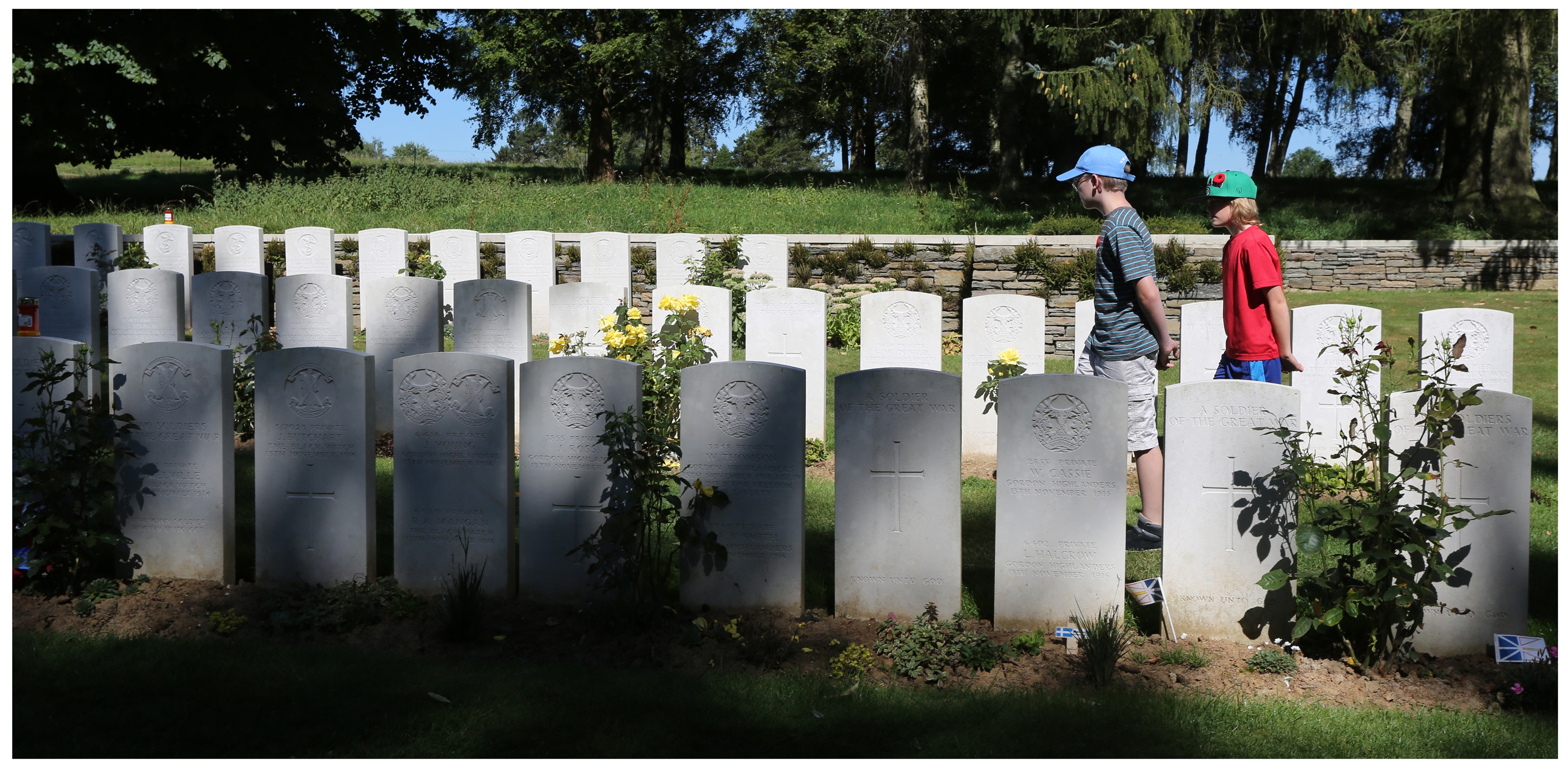 Thomas Daly, then 12, and 10-year-old Dylan Decker of St. John’s walk in Y Ravine Cemetery at Beaumont-Hamel. (Paul Daly) 