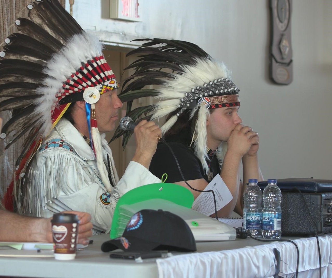 CAPC leader Guillaume Carle, left, at a recent meeting of the organization. (CBC)