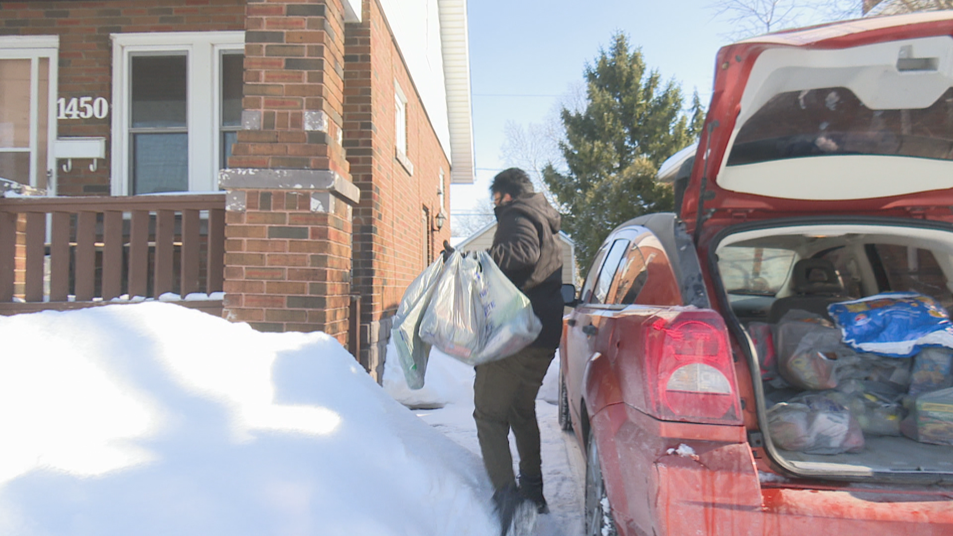 Zubair delivers hundreds of groceries and items to people each week. When Windsor-Essex went through its second COVID-19 wave he says people were especially grateful to see him, with some coming close to tears. (Talish Zafar/CBC)