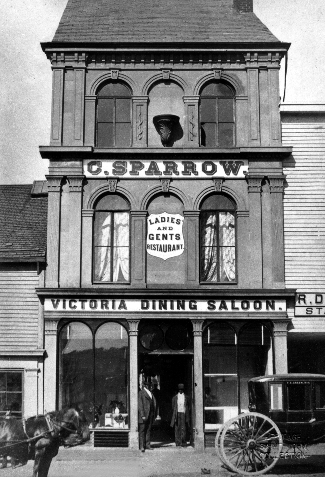 Cornelius Sparrow in front of the Victoria Dining Saloon on Germain Street in Saint John on June 20, 1877. (Heritage Resources Saint John)