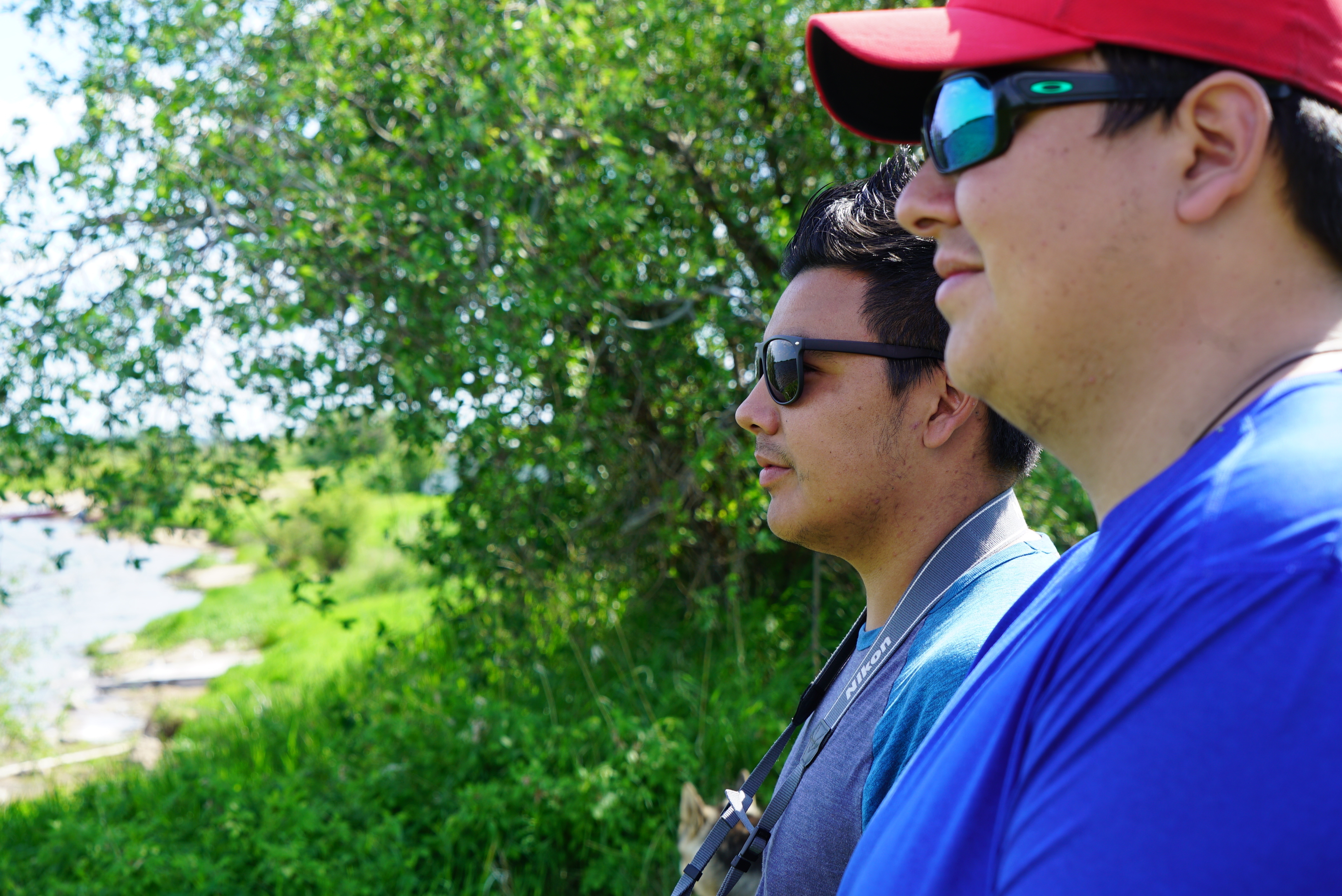 Jonah Natomagan, left, goes out on hunts with his friend Jordan Smith to practise his photography skills. (Madeline Kotzer/CBC)