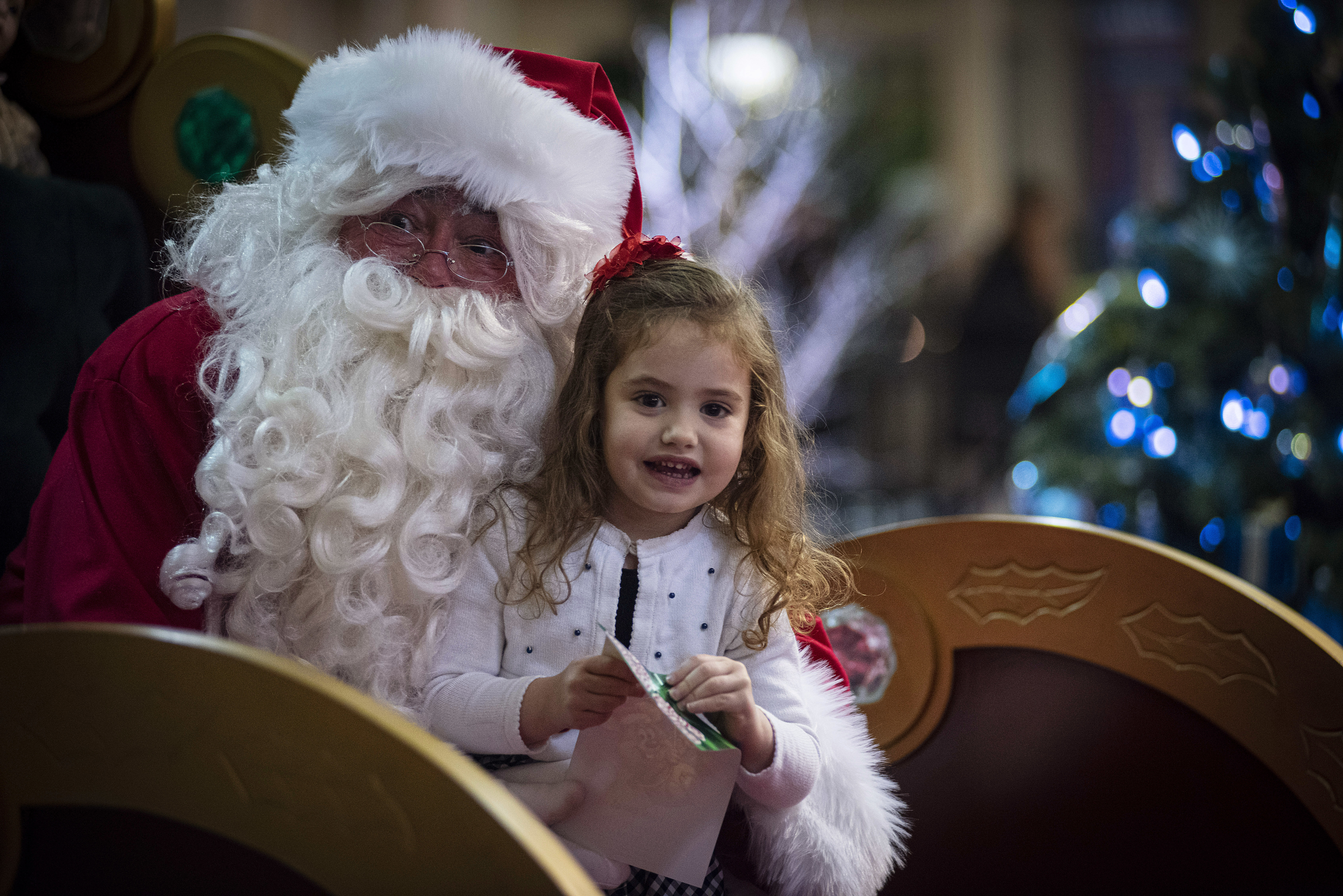 Santa Claus visits Charlottetown every holiday season and parents take their excited children to tell the old elf just what they want for Christmas. Three-and-a-half-year-old Keeva Hately of Charlottetown wasted no time in giving Santa her list. She was visiting the Confederation Court Mall with her grandmother, Marleen Wolfe. (Brian McInnis/CBC)