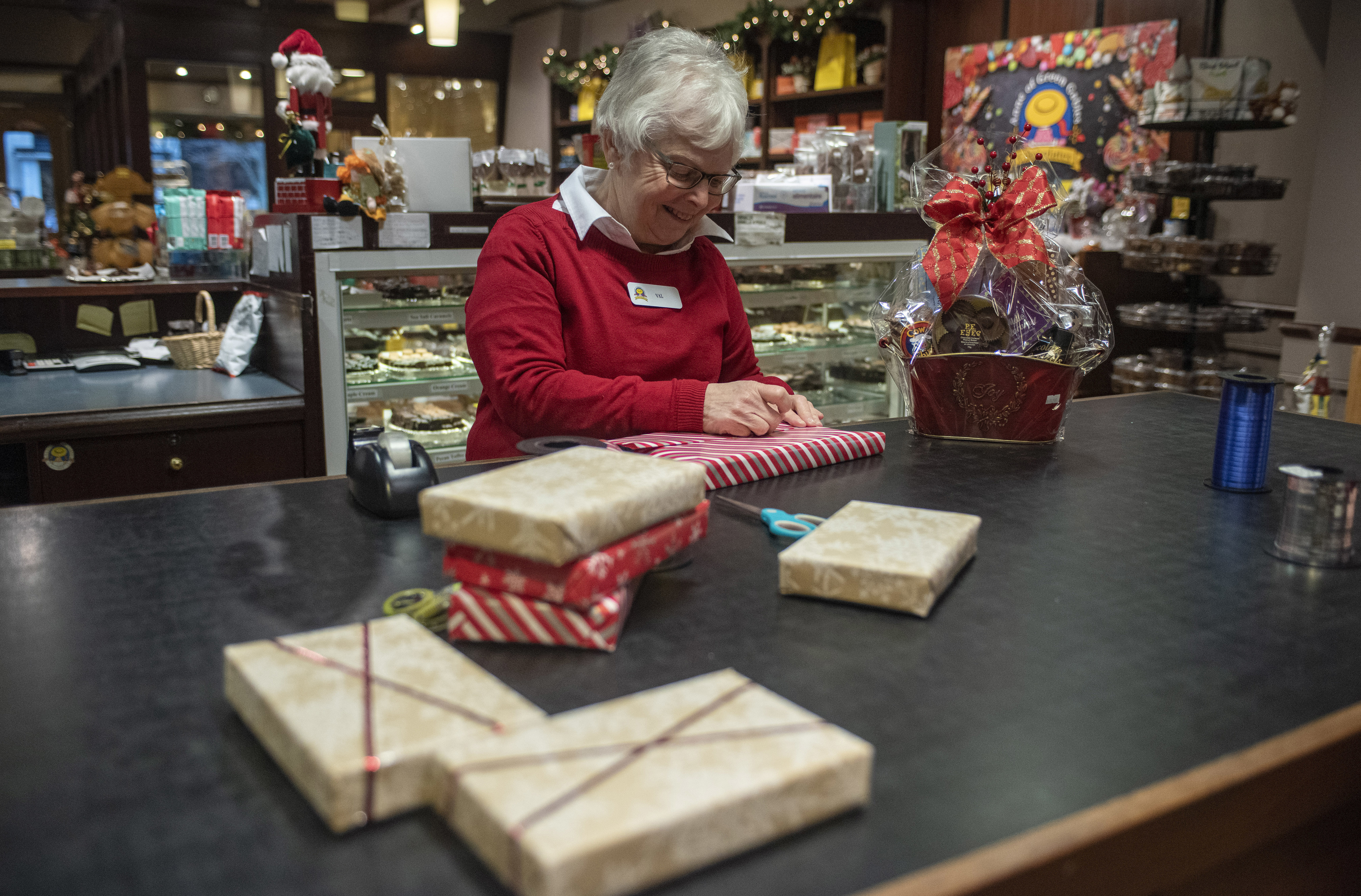  With Christmas comes much wrapping, as Valerie Maund can attest. She is a sales associate at Anne of Green Gables Chocolates in Charlottetown. (Brian McInnis/CBC)