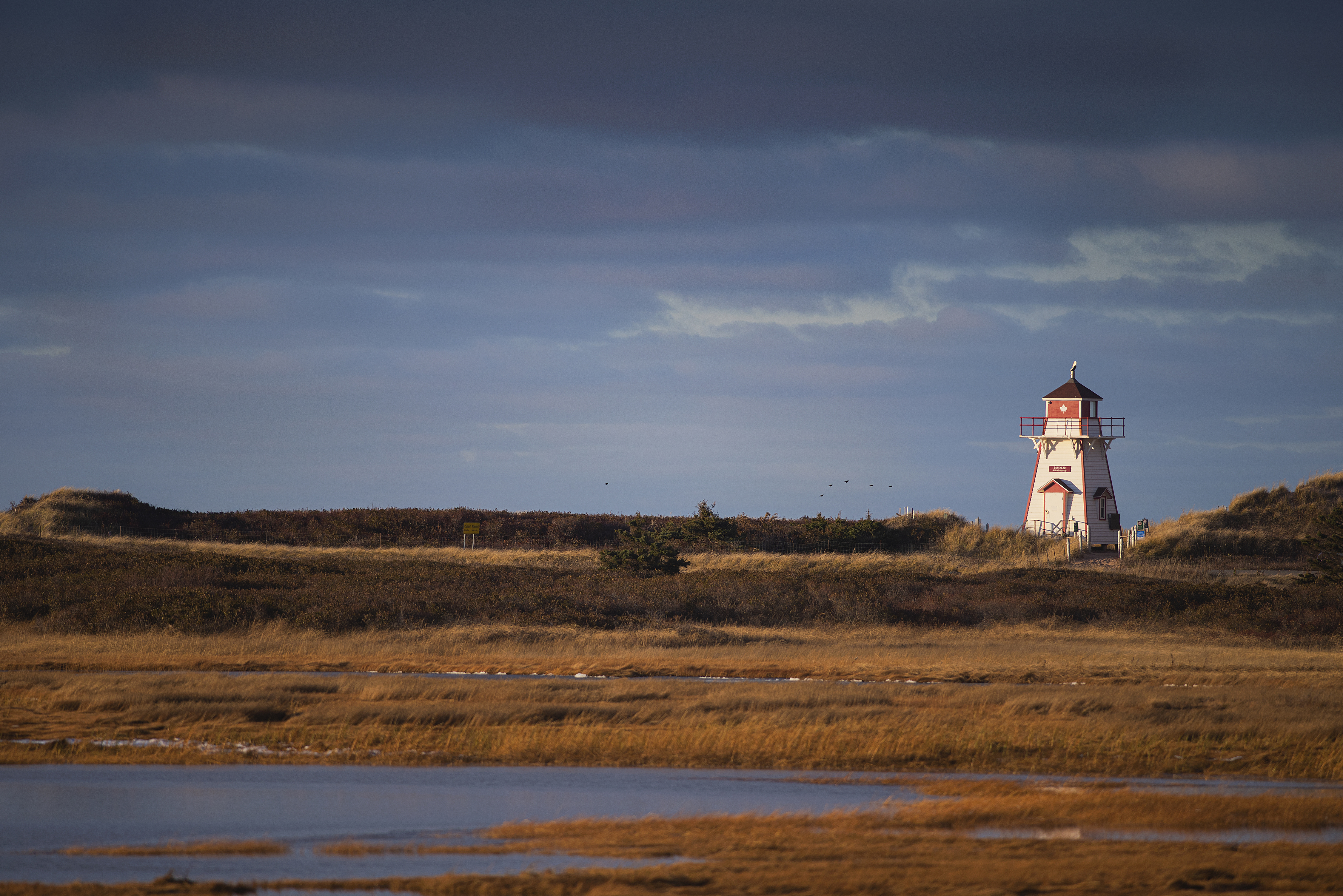 The lighthouse features a plaque that commemorates the Yankee Gale in 1851 that wrecked 80 boats and killed 161 sailors. (Brian McInnis/CBC)