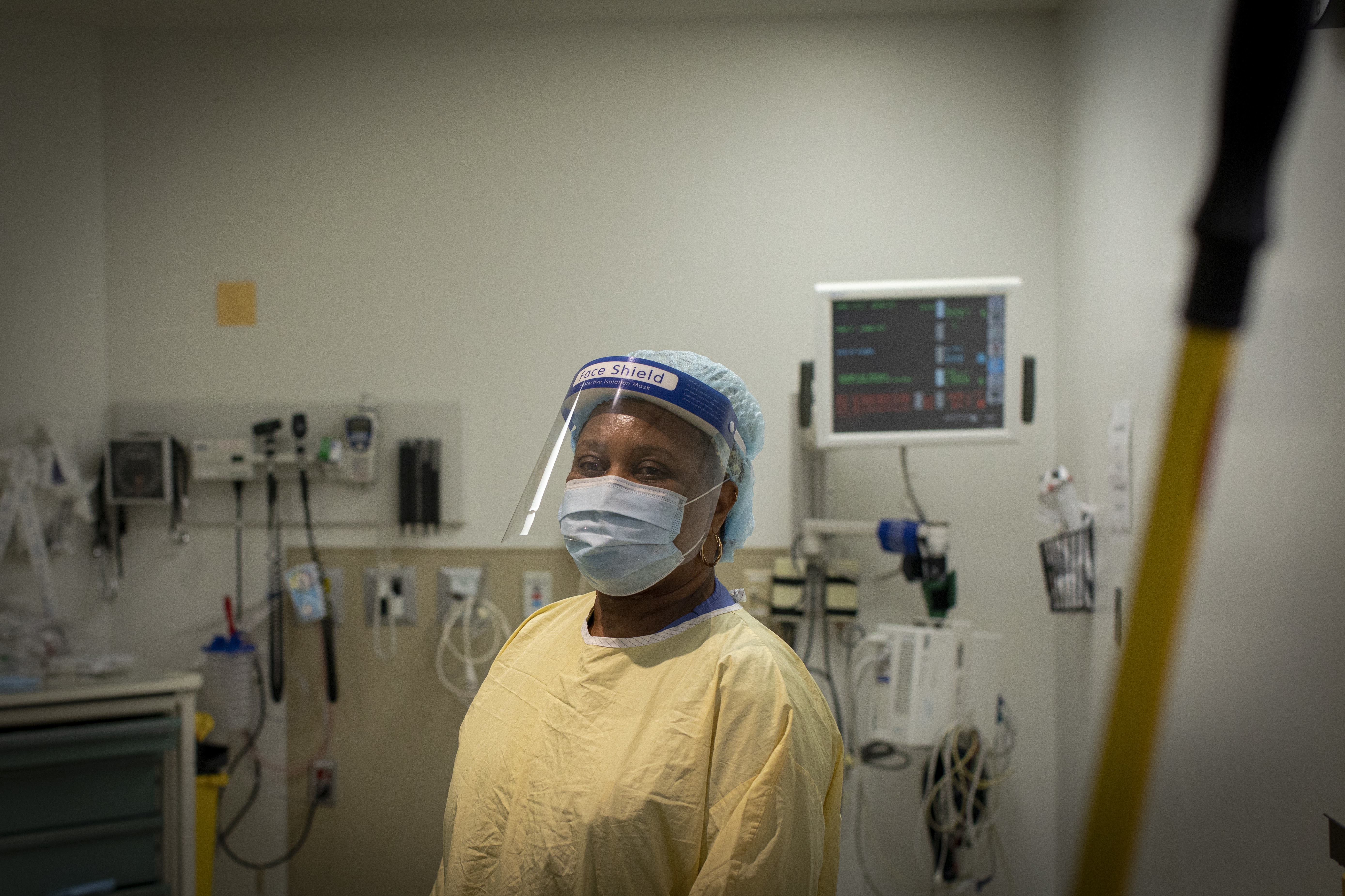 Every shift at Scarborough General, custodian Paula Clarke is cleaning rooms to keep people safe, all while carrying memories of her mother who died of COVID-19. (Evan Mitsui/CBC)