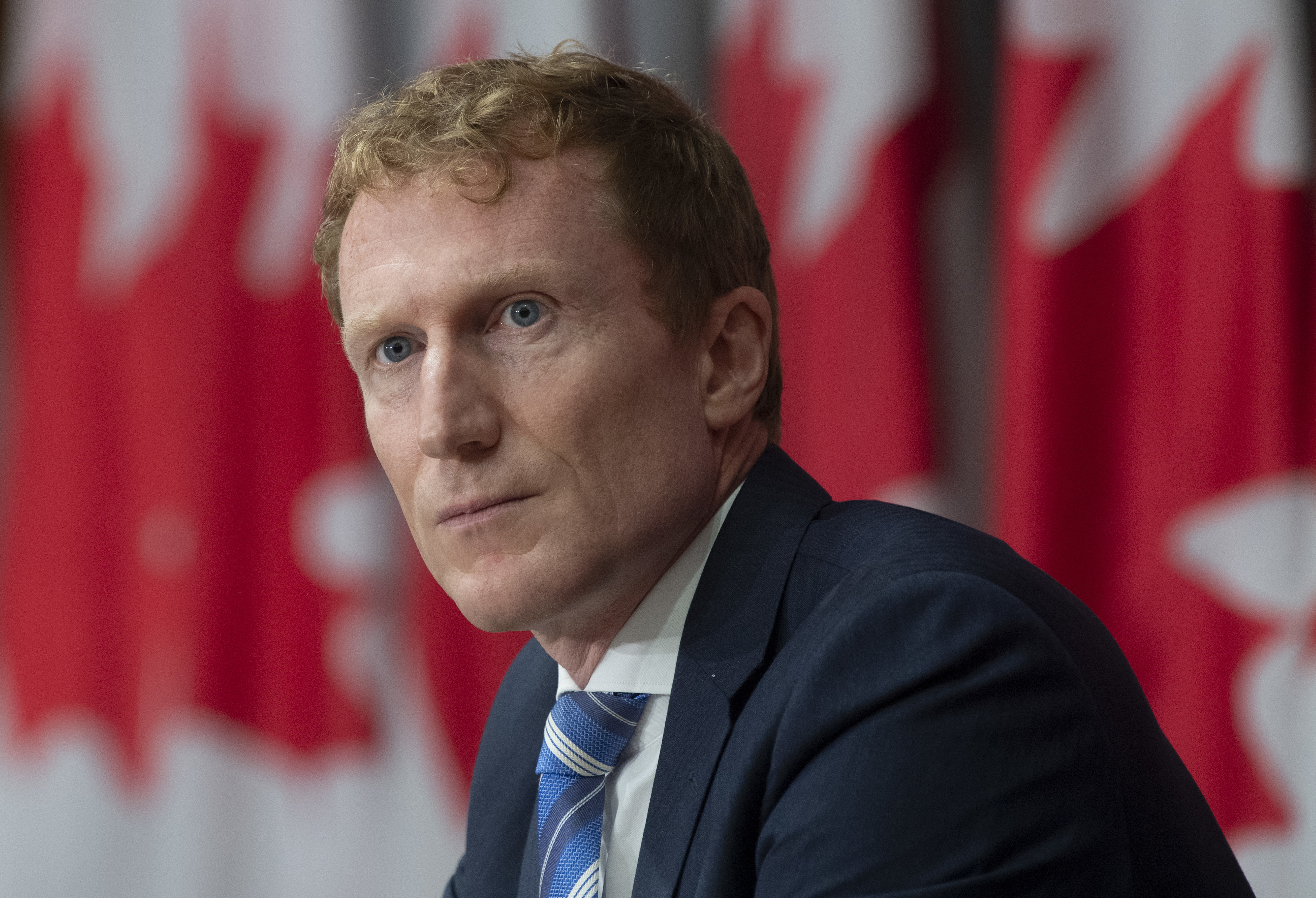 Indigenous Services Minister Marc Miller listens to a question during a news conference in Ottawa, Aug. 12, 2020. (Adrian Wyld/Canadian Press]