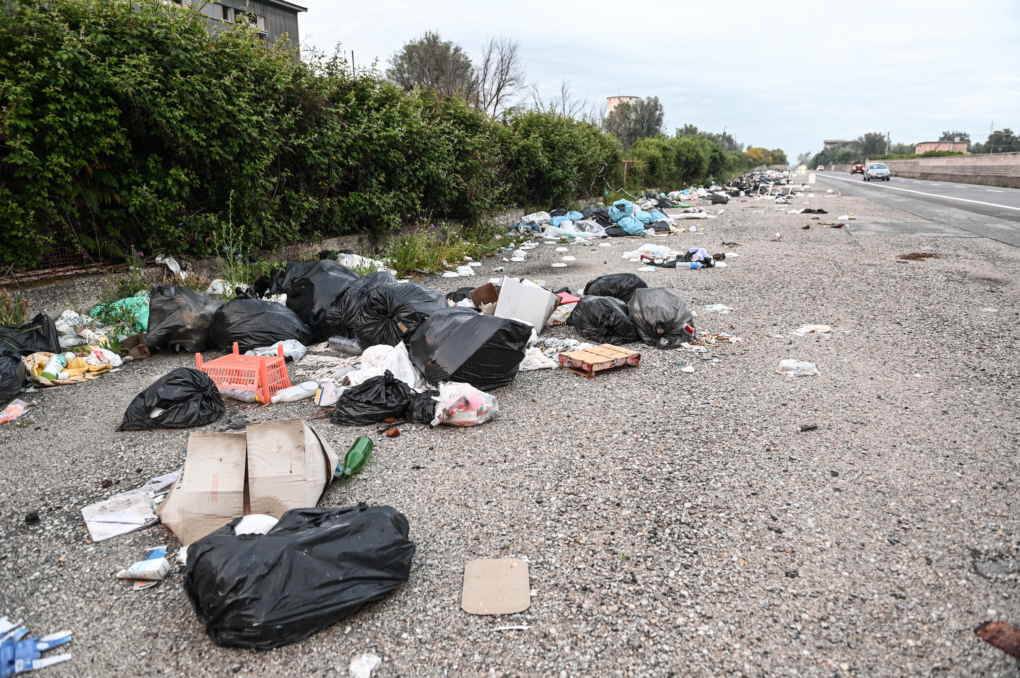 Garbage strewn along a stretch of road is one of many signs of the hostility towards public space expressed in Mafia cultures. (Chris Warde-Jones)  