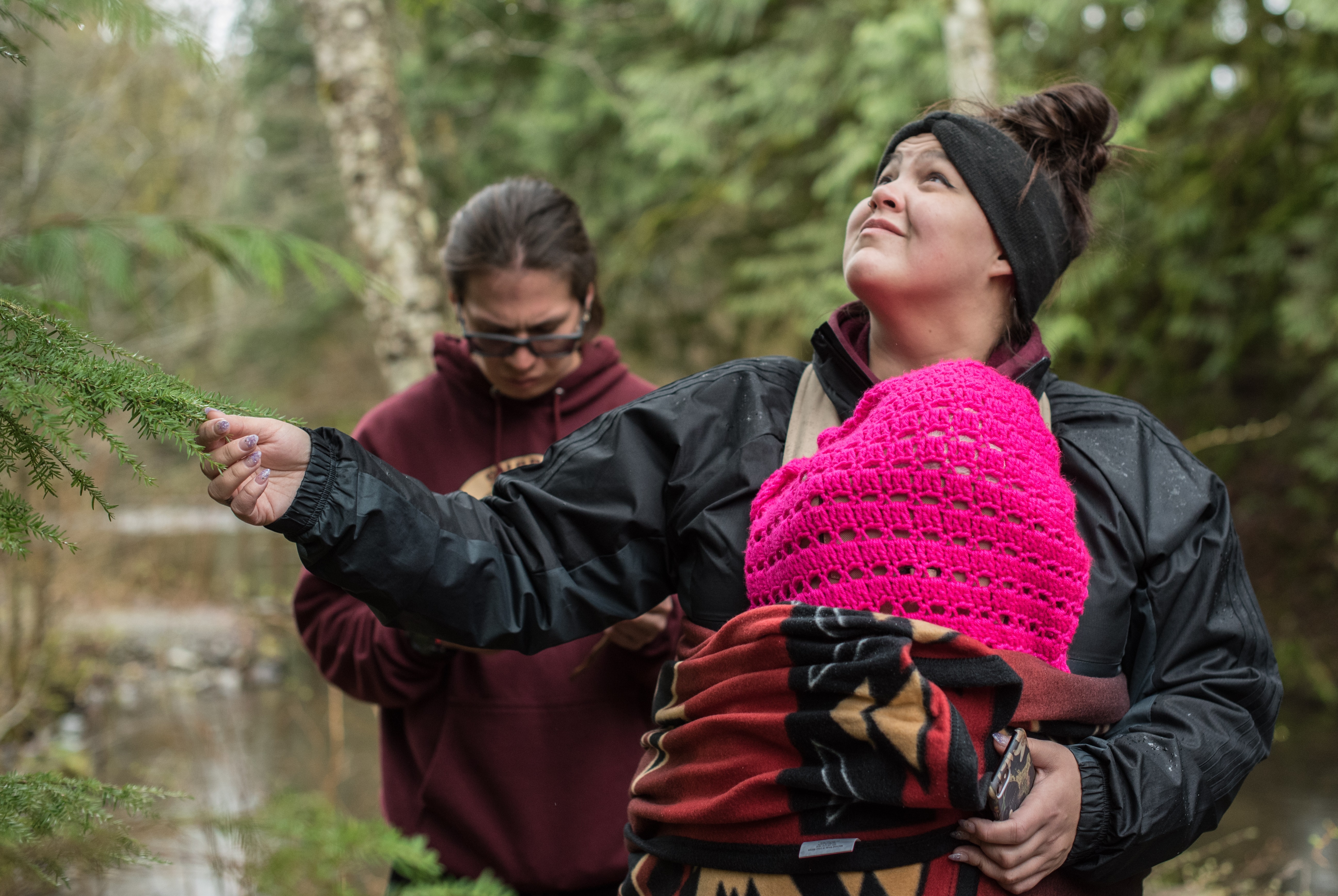 Char George looks at a tree after learning its traditional name during a class field trip to the traditional longhouse at Chiyák’mesh stakw, a piece of land on the bank of the Cheakamus River, just north of Squamish, B.C. (Dustin Patar/Marc Fawcett-Atkinson)