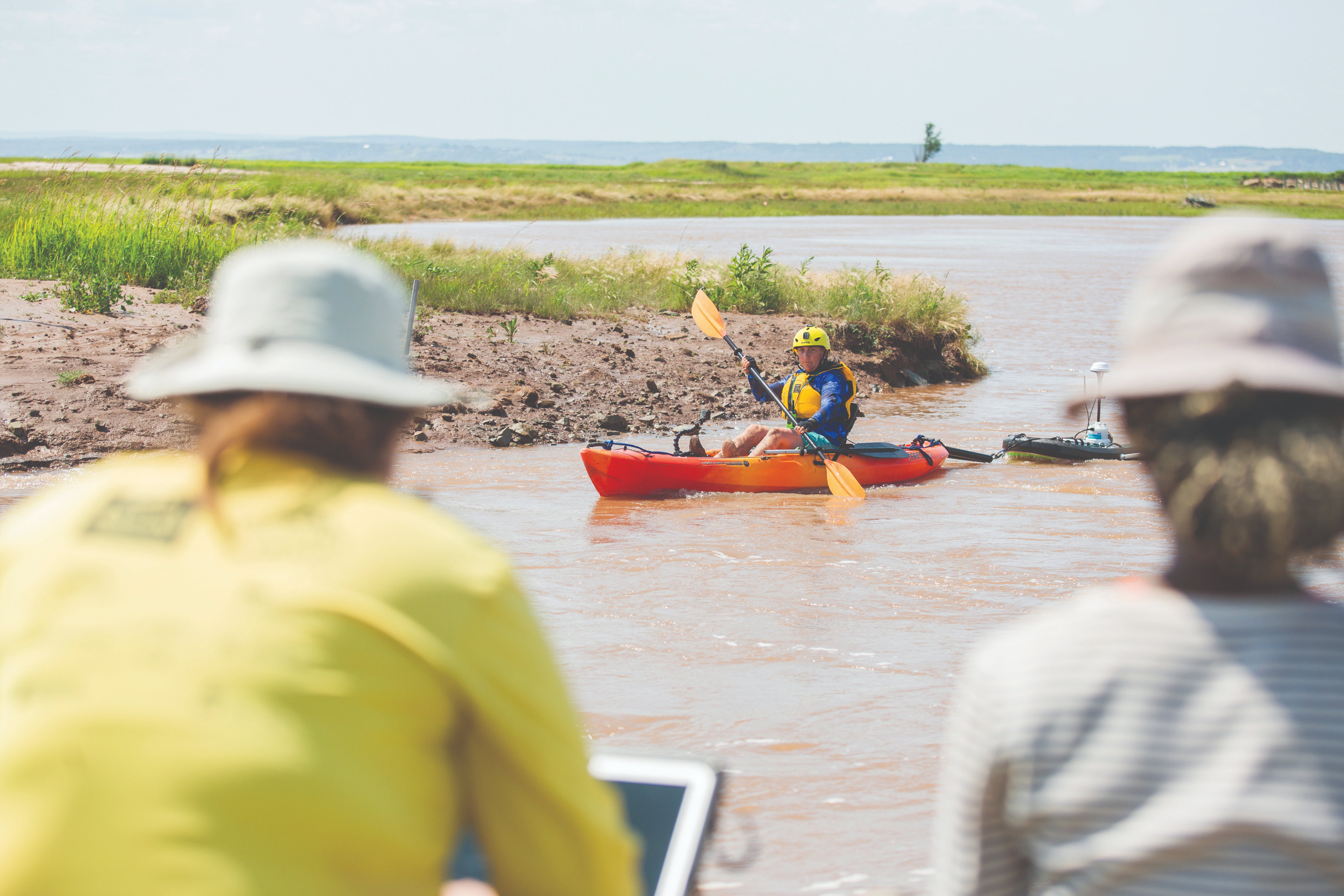 Danika van Proosdij collects bathymetric data in a newly flooded area at the Converse Marsh site in 2019. (ThreeSixFiveMedia)