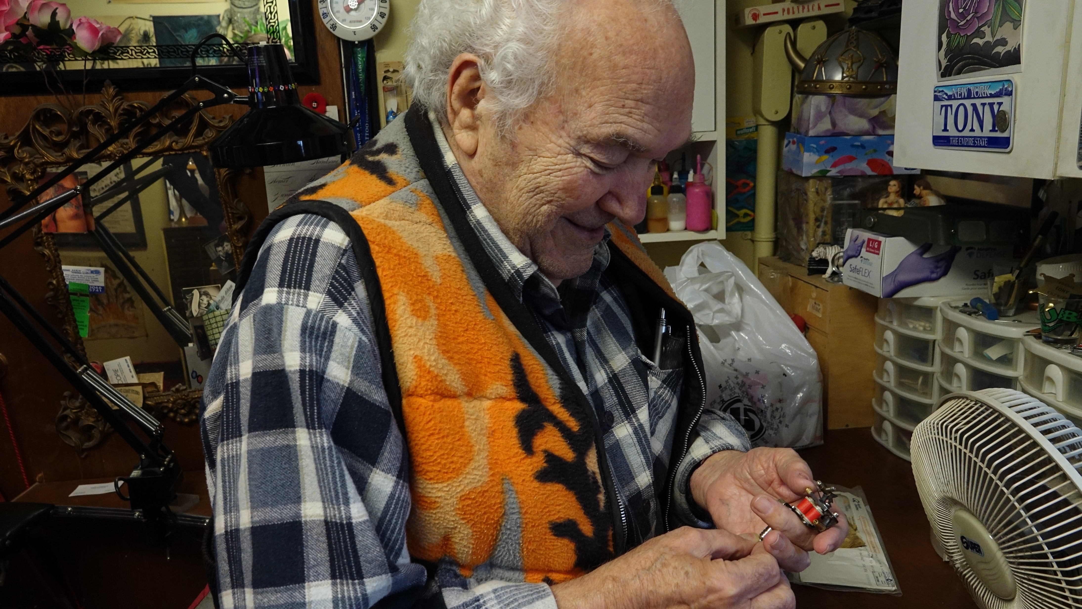 Every day, Tony D’Annessa walks from his home across the street to the tattoo shop on Centre Street. (Melinda Dalton/CBC)