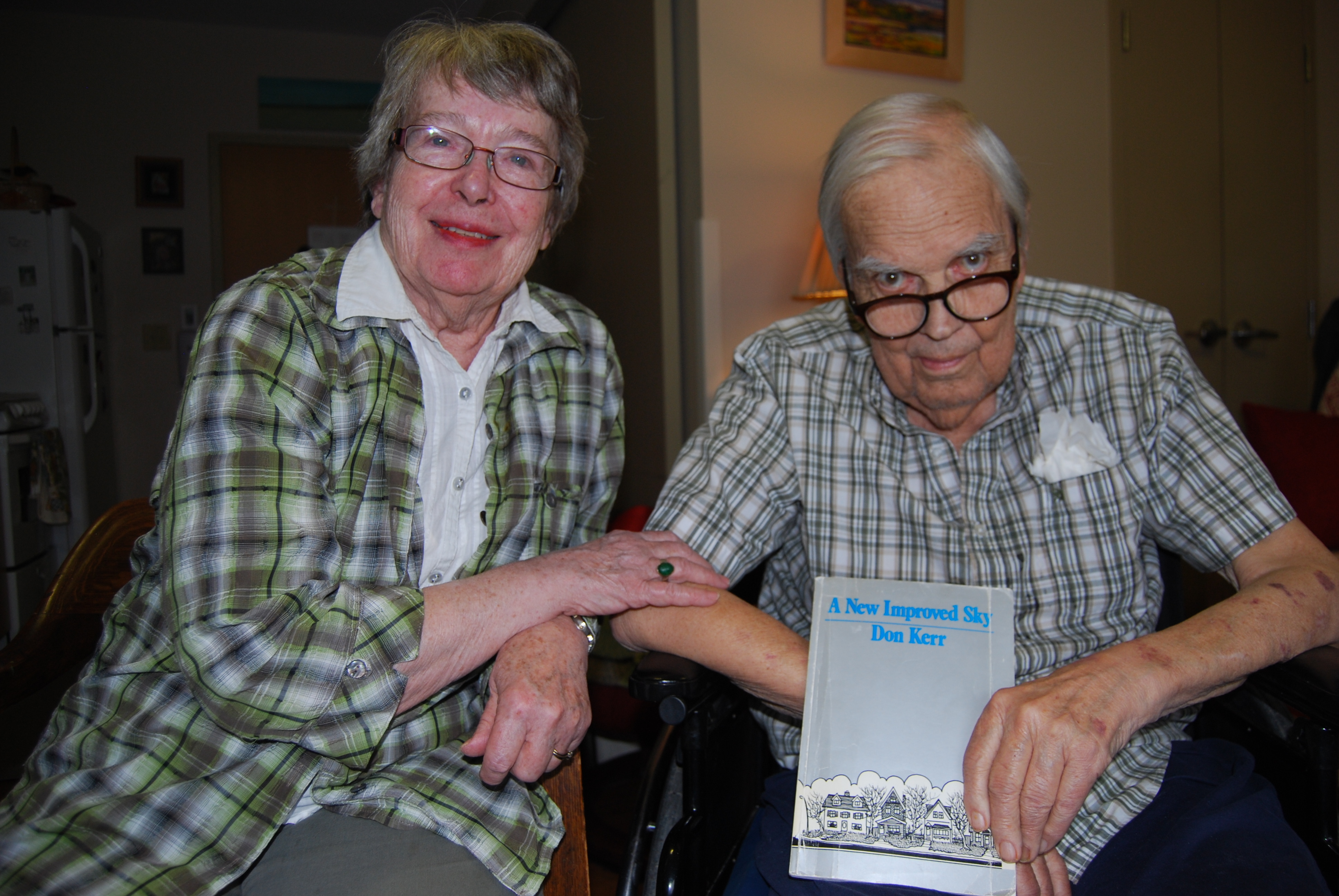 Mildred and Don Kerr are pictured here in 2019. The couple had their first date at the Capitol, which Kerr would memorialize in a fiery poem published in his book "A New Improved Sky." (Guy Quenneville/CBC)