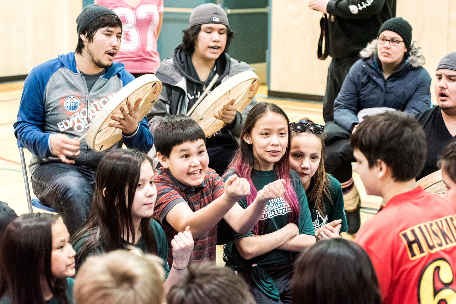 Young boys and girls play hand games together in Yellowknife during territorial youth traditional games championships. (Walter Strong/CBC)