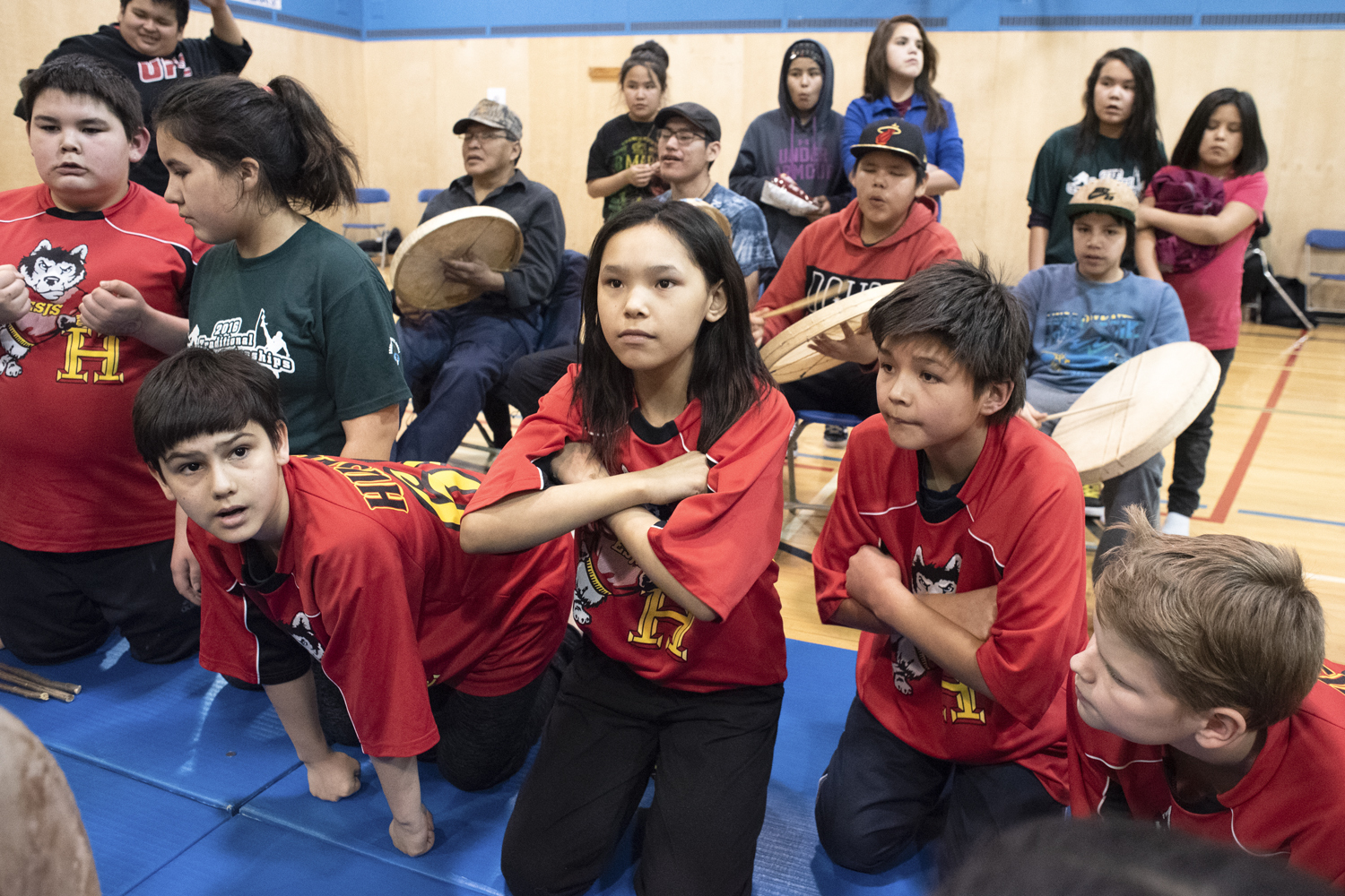 Young boys and girls play hand games together in Yellowknife during territorial youth traditional games championships. (Walter Strong/CBC)