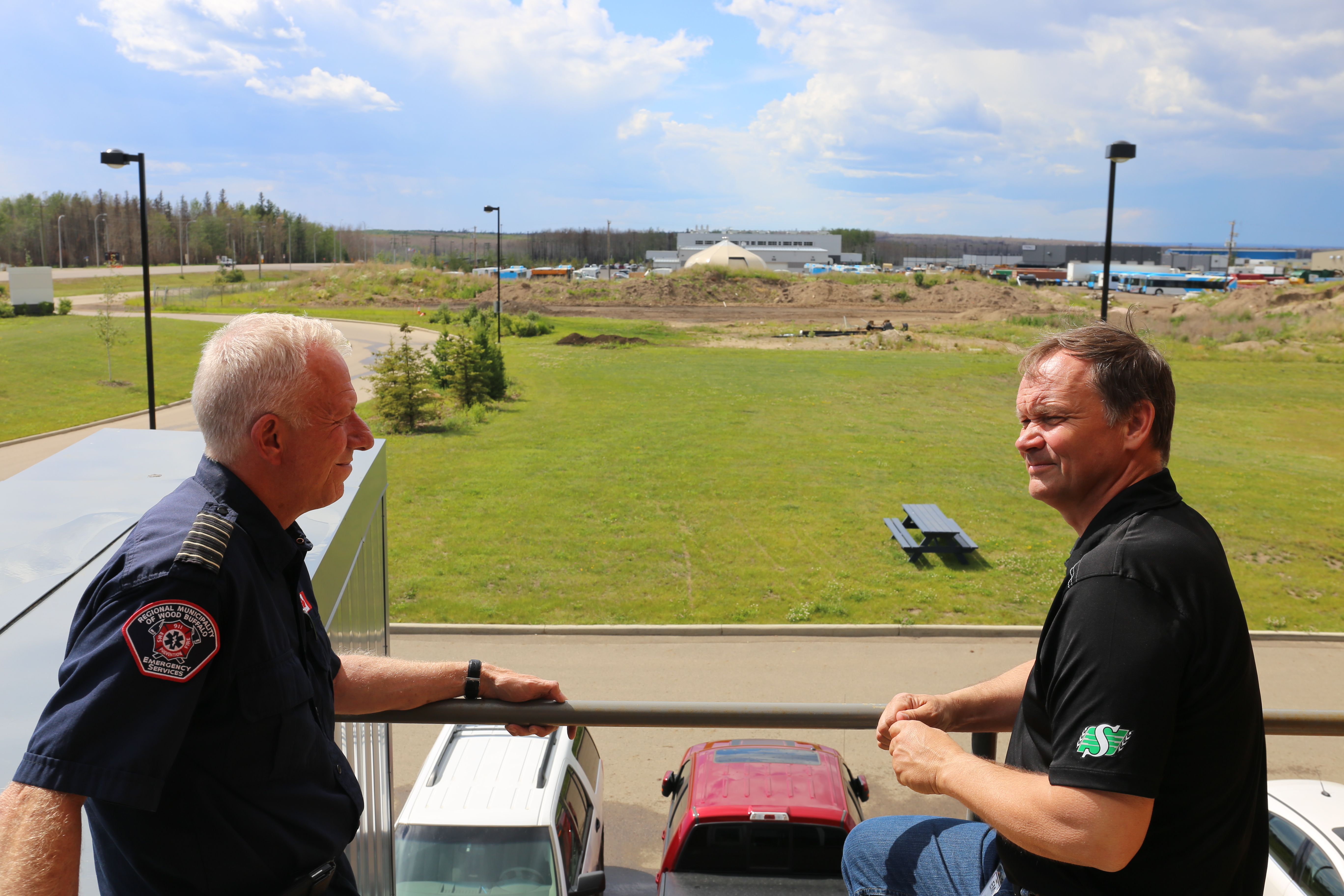 Darby Allen, left, and Dale Bendfeld, right, pause for reflection during an interview in June 2016. (Marion Warnica/CBC)