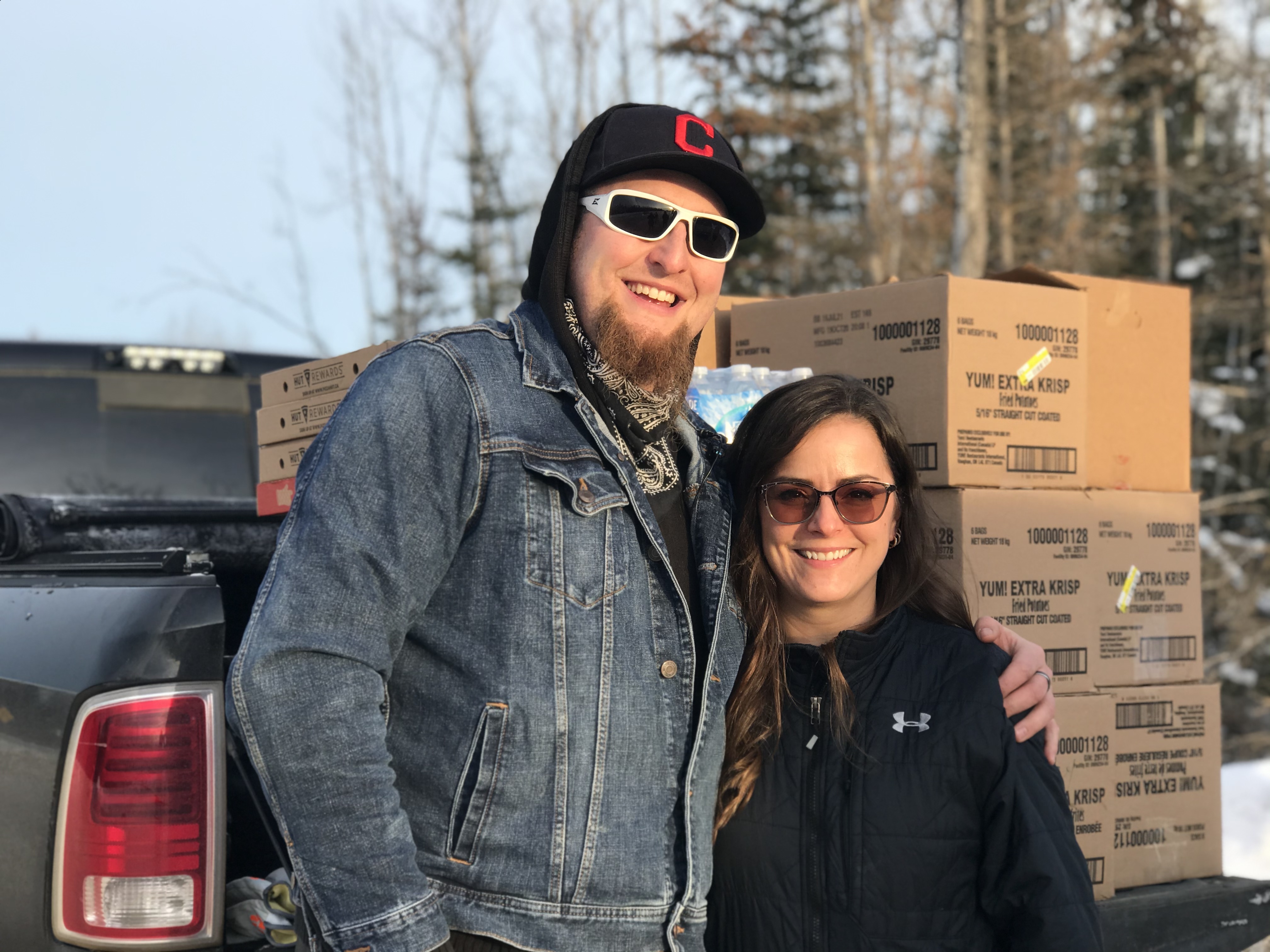 Denis and Jen Feestra, his wife, run the errands down south and help Shank get the goods to the border. (Anna Desmarais/CBC)