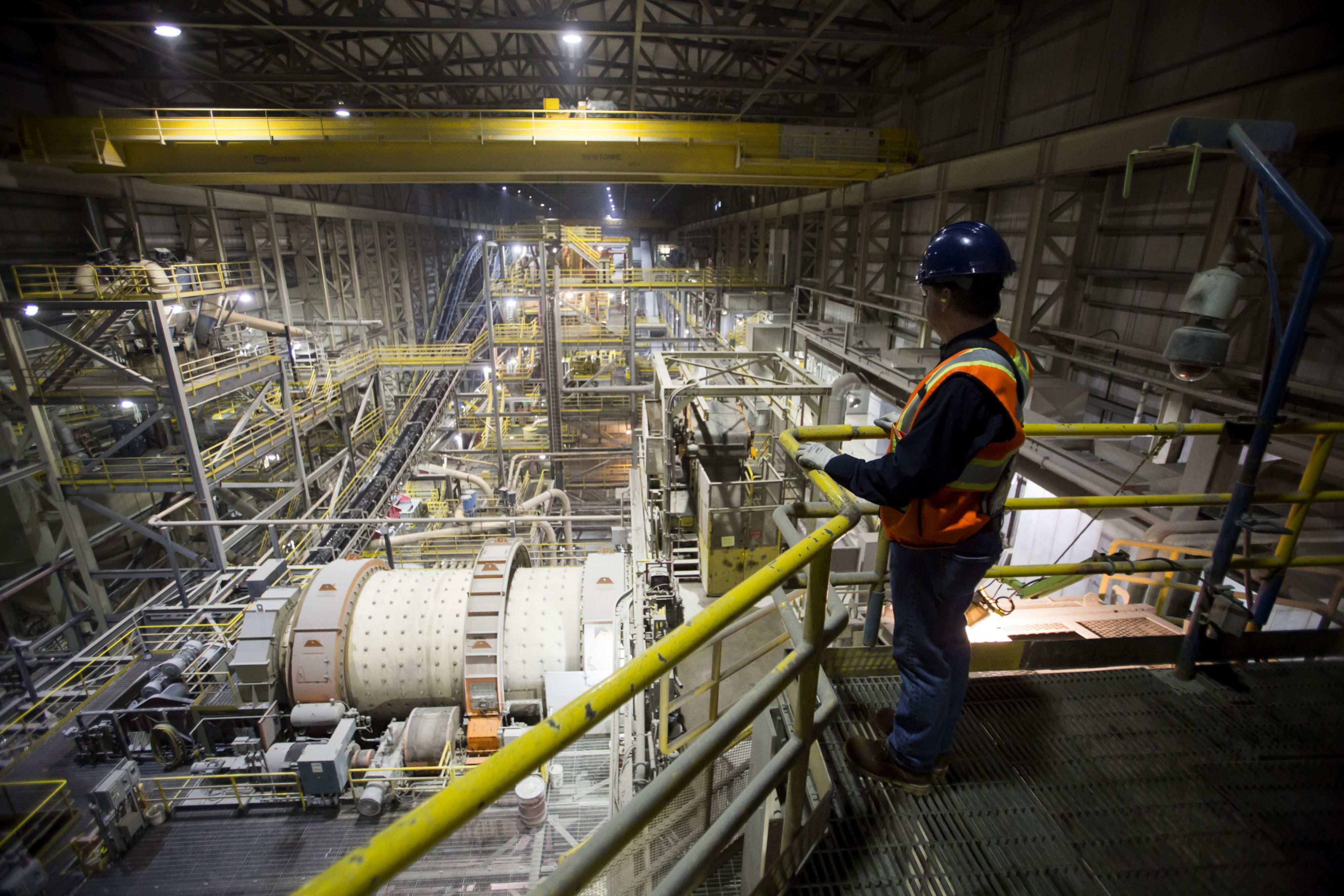 A worker is shown at the Diavik mine in the Northwest Territories. Dominion has a 40 per cent stake in Diavik and owns the Ekati diamond mine. (Ben Nelms / Bloomberg)