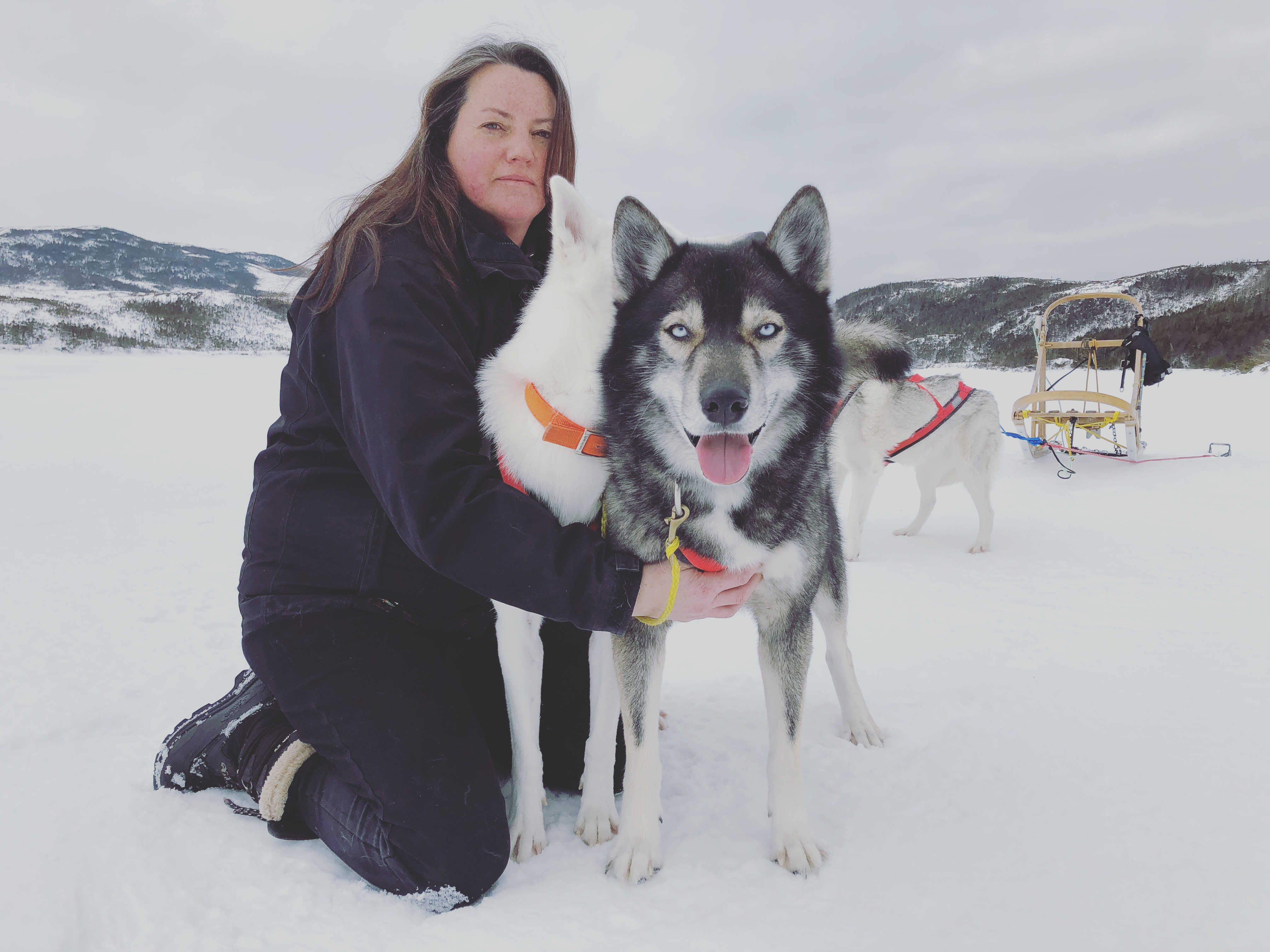  Angie and Diesel share a moment on Western Cove Pond, in February 2020. (Gavin Simms/CBC)